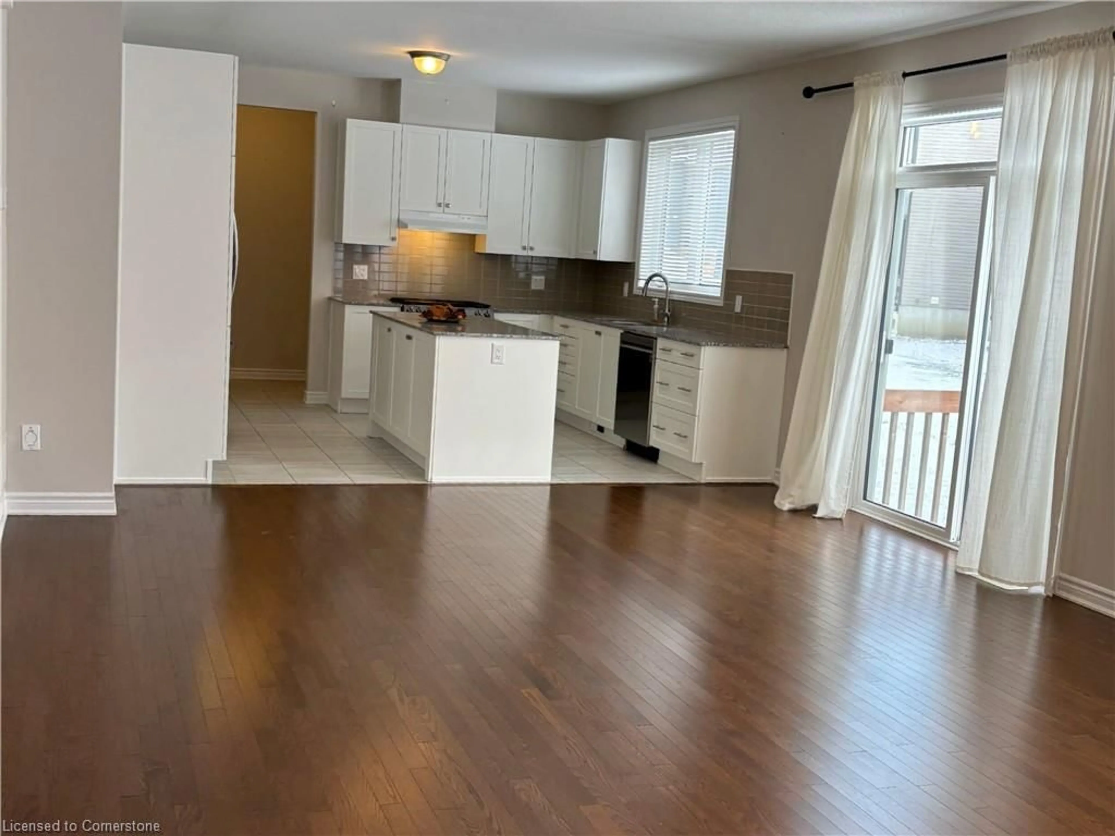 Open concept kitchen, wood/laminate floor for 752 Vennecy Terr, Ottawa Ontario K1W 0M8