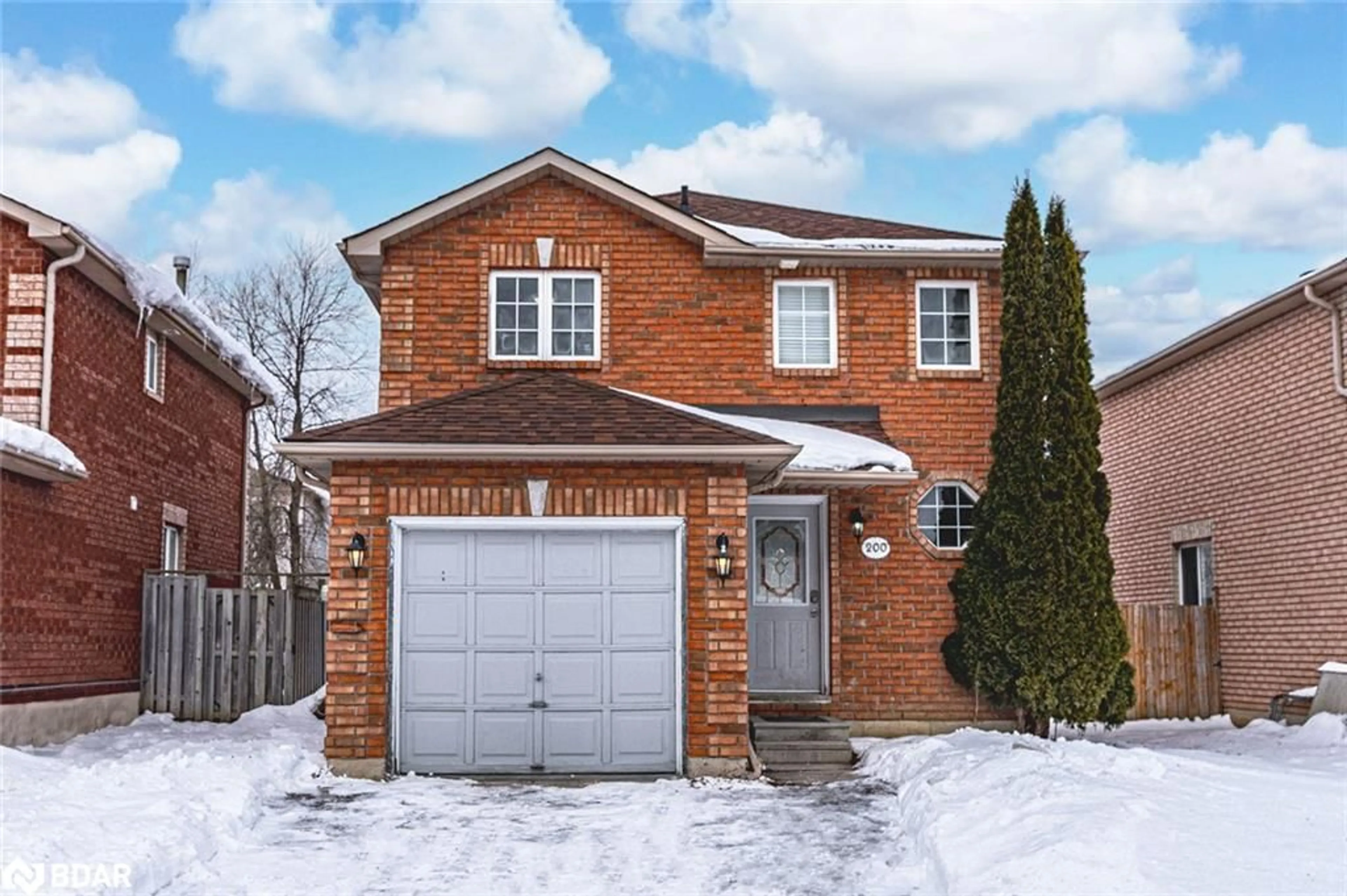 Home with brick exterior material, street for 200 Dunsmore Lane, Barrie Ontario L4M 6Z8