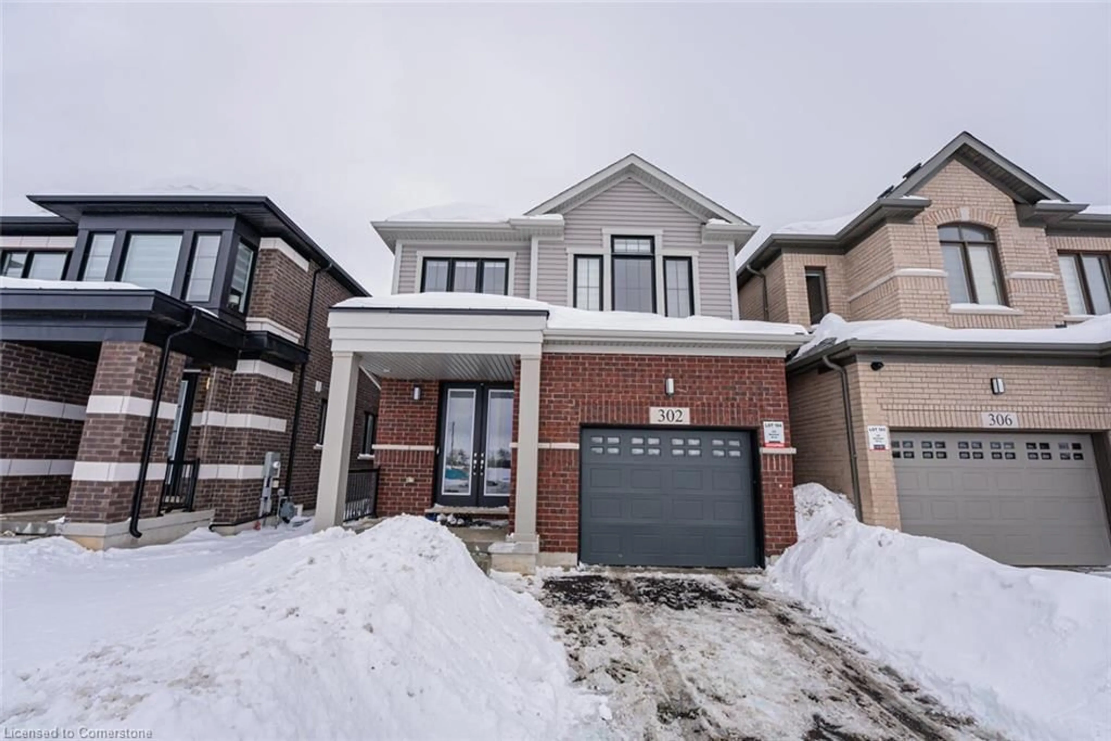 Home with brick exterior material, street for 302 Newman Dr, Cambridge Ontario N1S 0E1