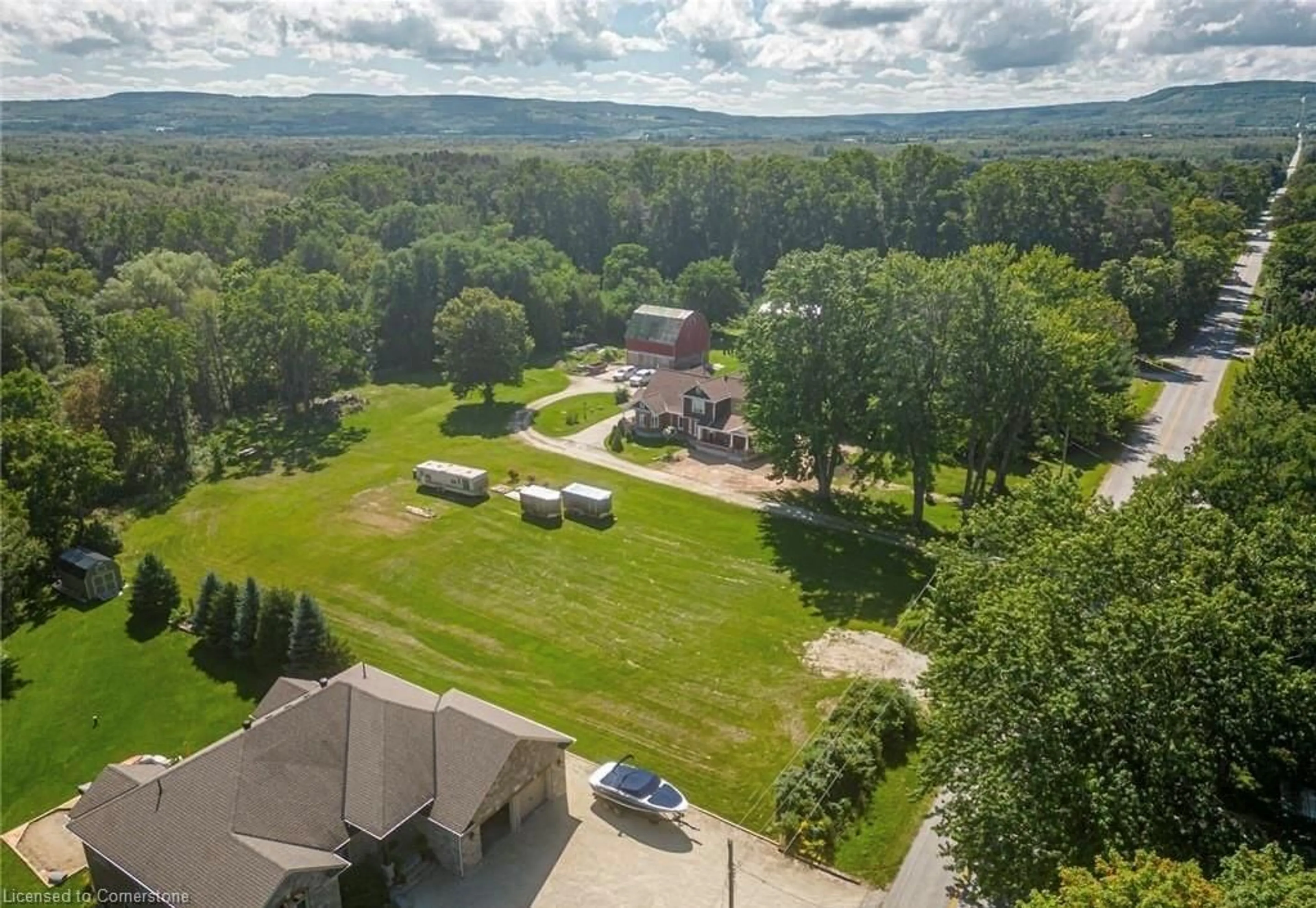 A pic from outside/outdoor area/front of a property/back of a property/a pic from drone, mountain view for 7639 36/37 Nottawasaga Sideroad, Nottawa Ontario L0M 1P0