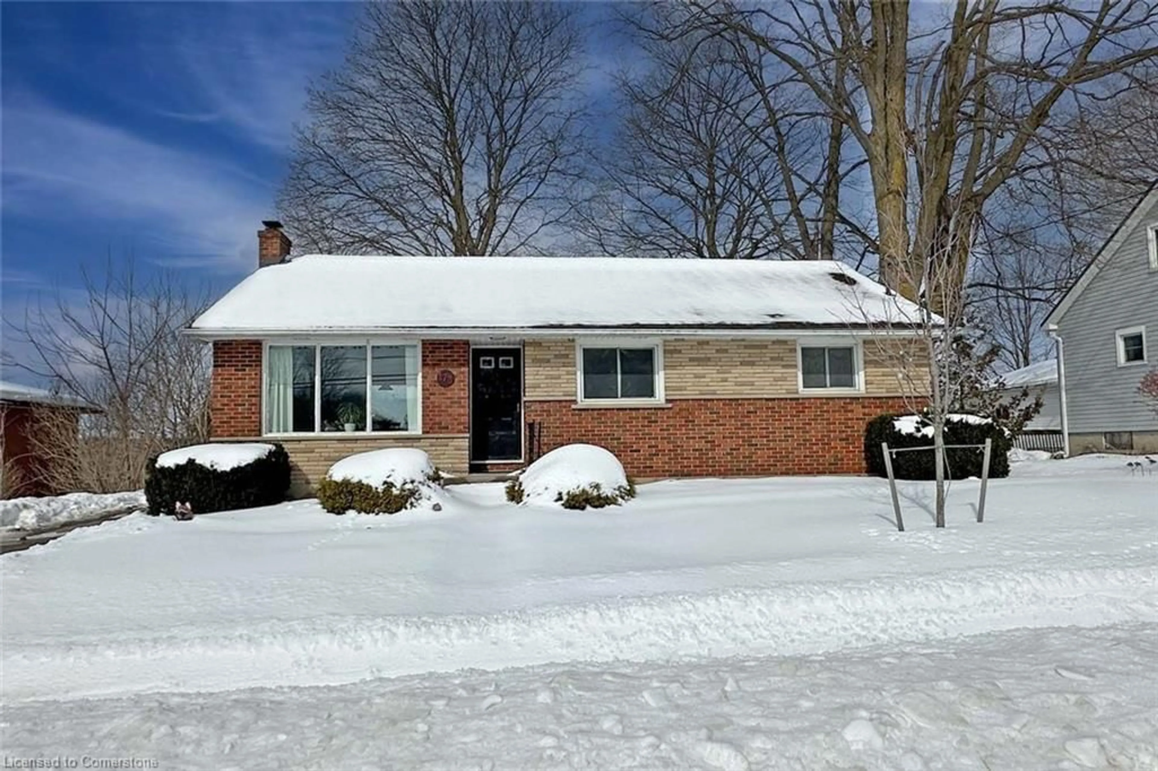 Home with brick exterior material, street for 173 Park Row, Woodstock Ontario N4S 1V9