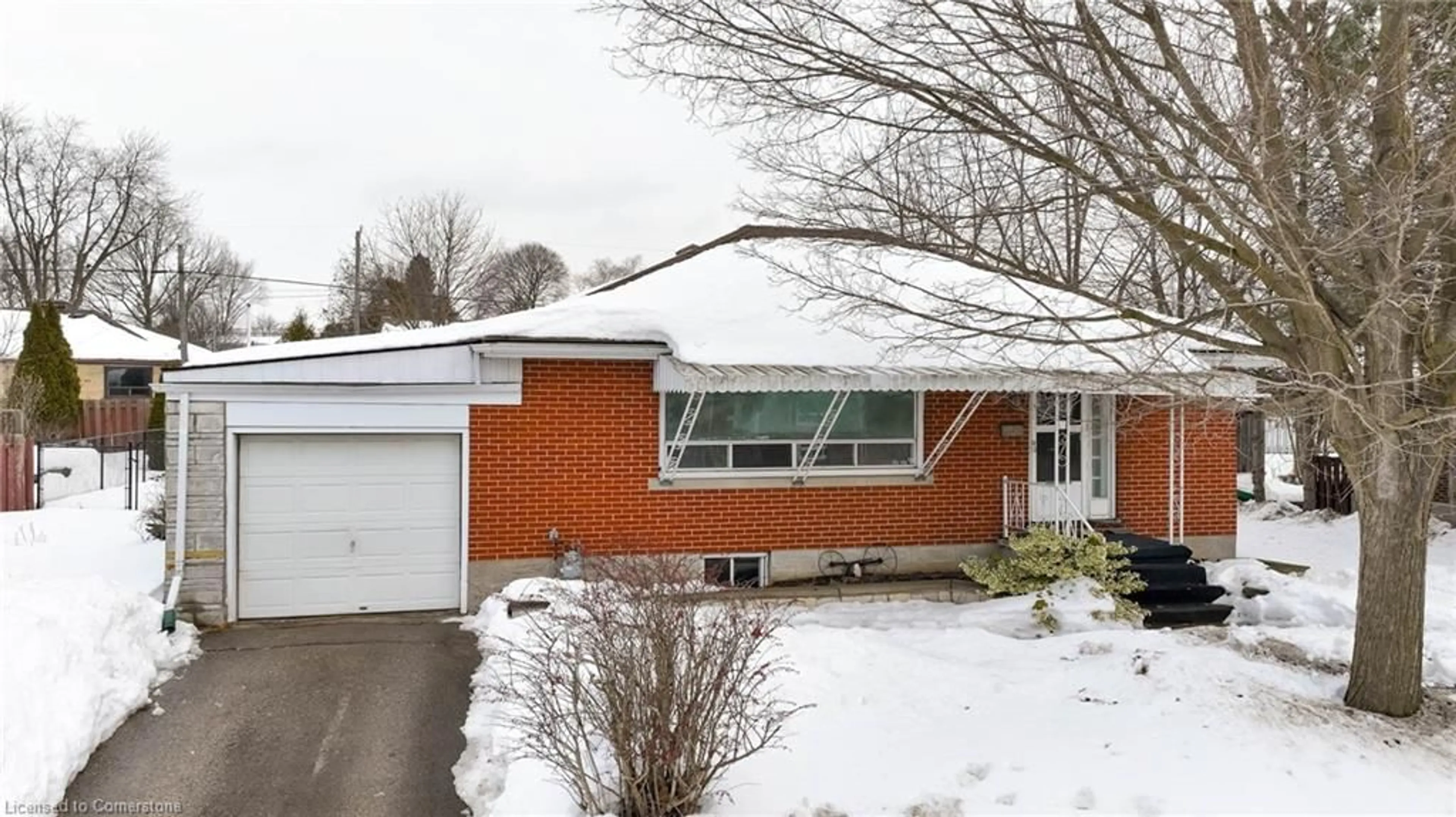 Home with brick exterior material, street for 13 Ridgewood Ave, Guelph Ontario N1H 6C3