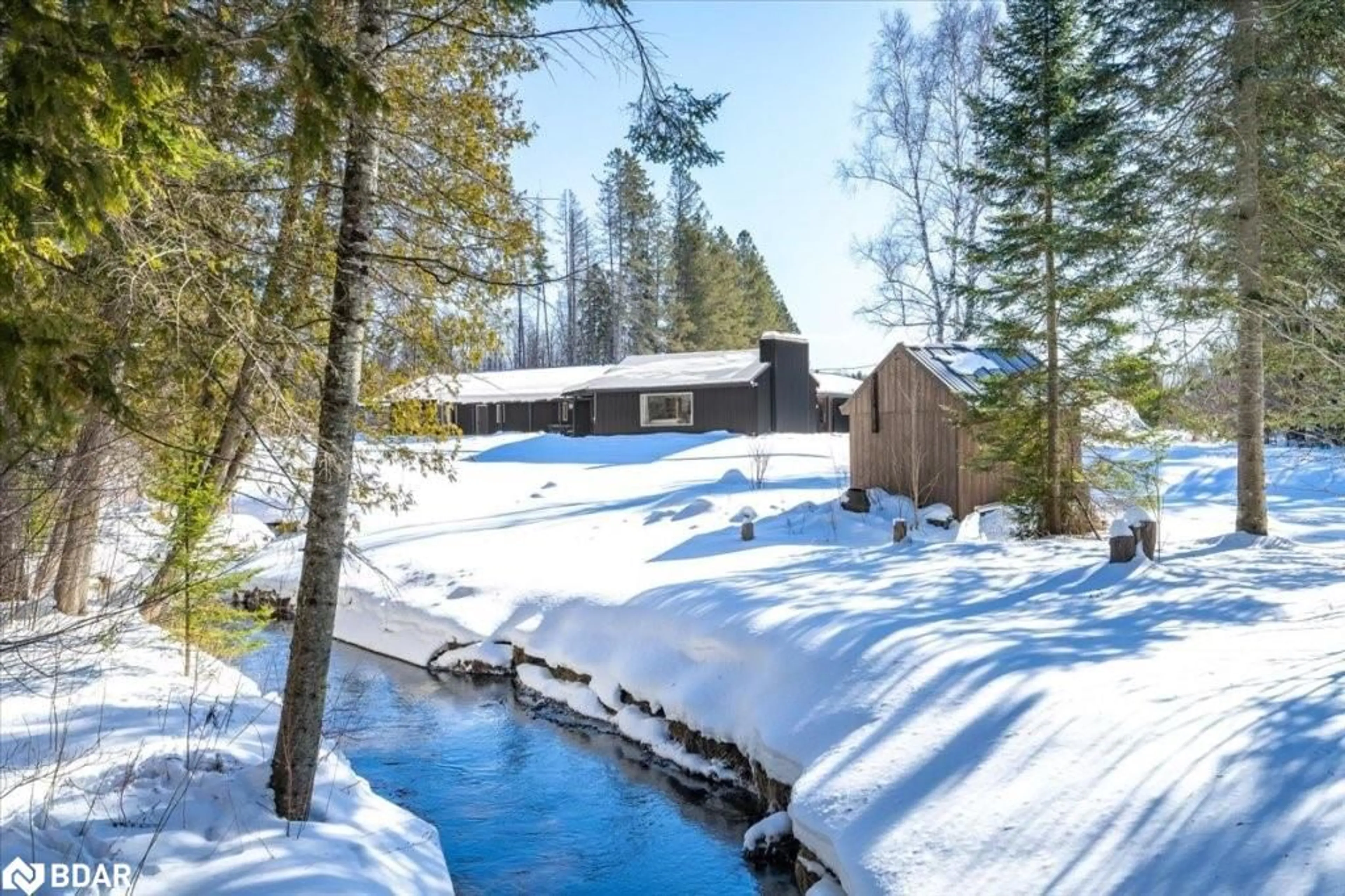 A pic from outside/outdoor area/front of a property/back of a property/a pic from drone, water/lake/river/ocean view for 1076 Beaver Lane, Midhurst Ontario L9X 0M1