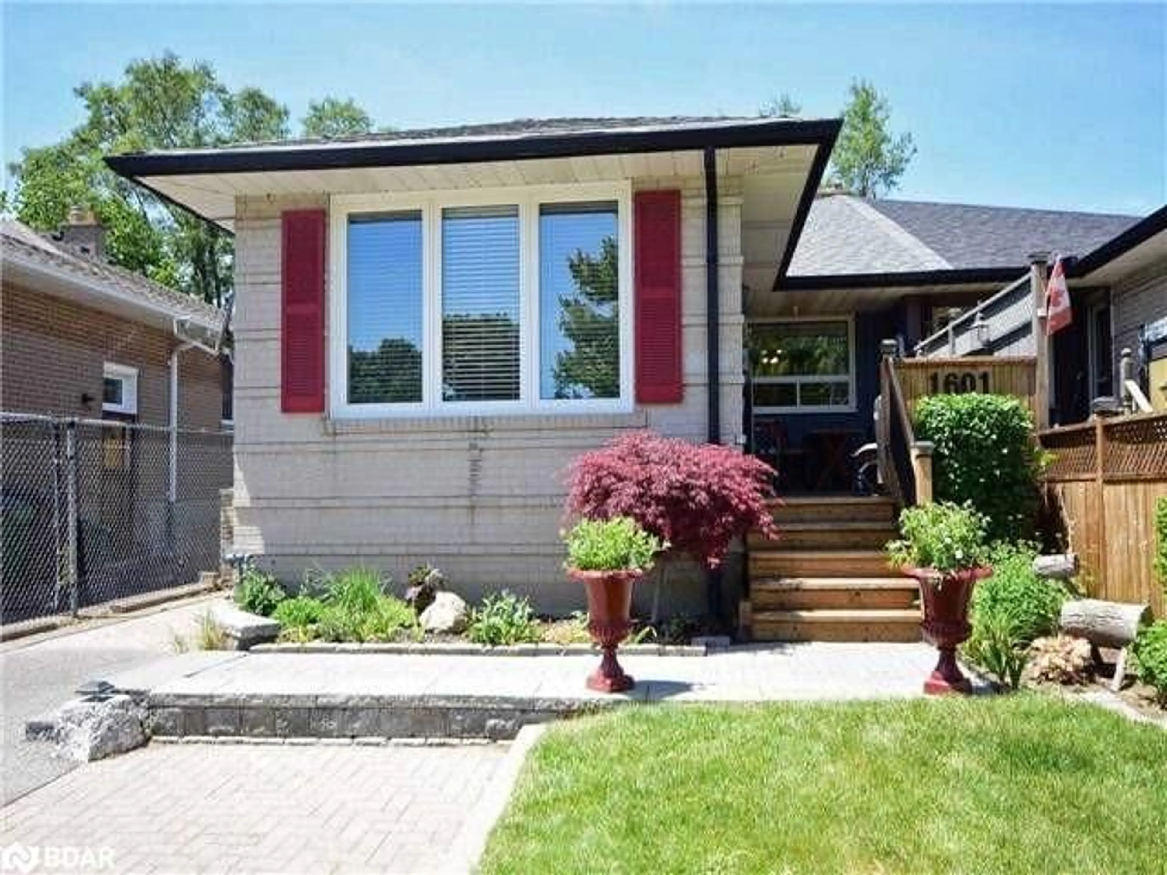 Home with brick exterior material, street for 1601 Sandgate Cres #LOWER, Mississauga Ontario L5J 2E3