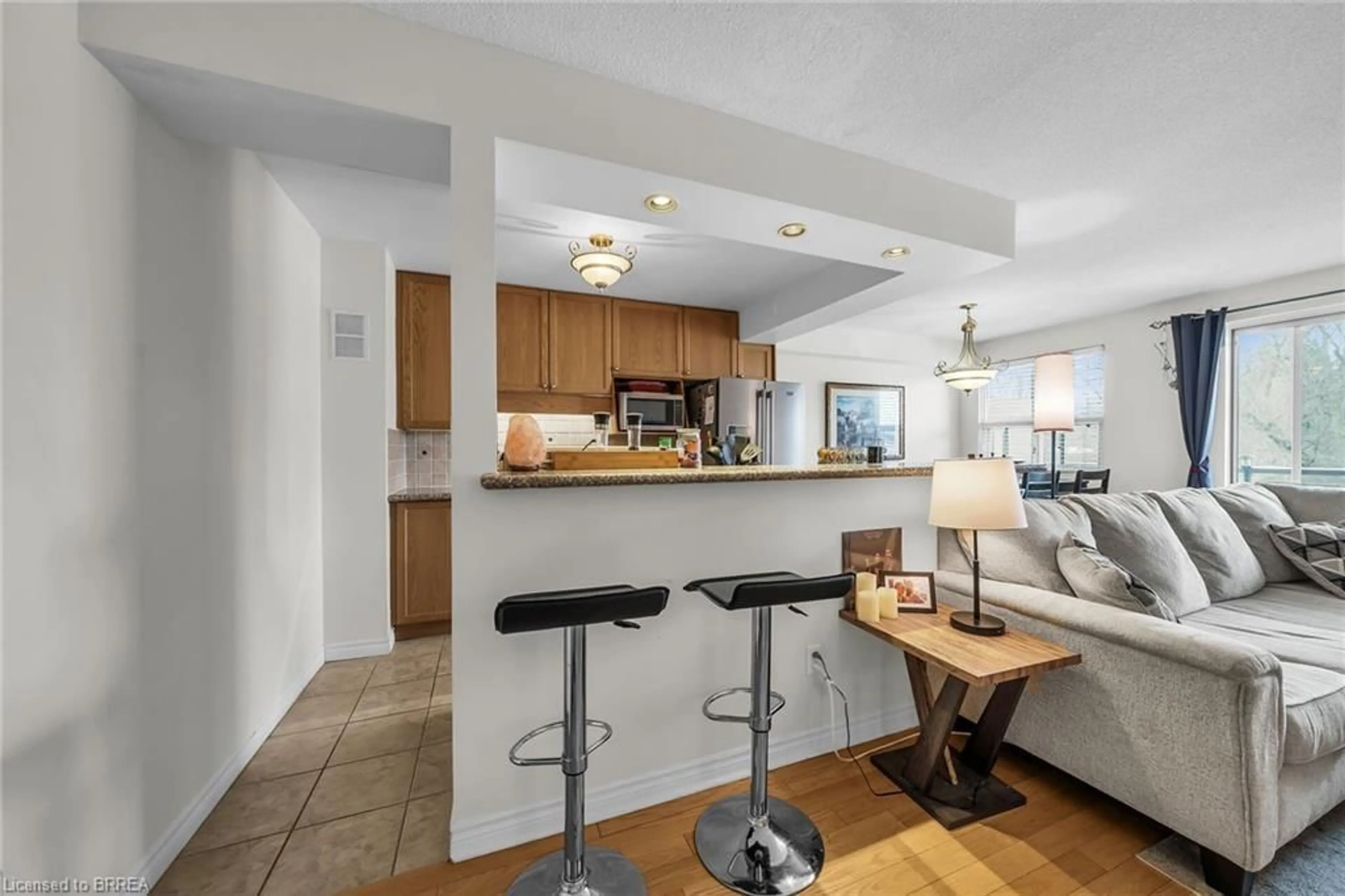 Open concept kitchen, ceramic/tile floor for 793 Colborne St #211, Brantford Ontario N3S 7J3