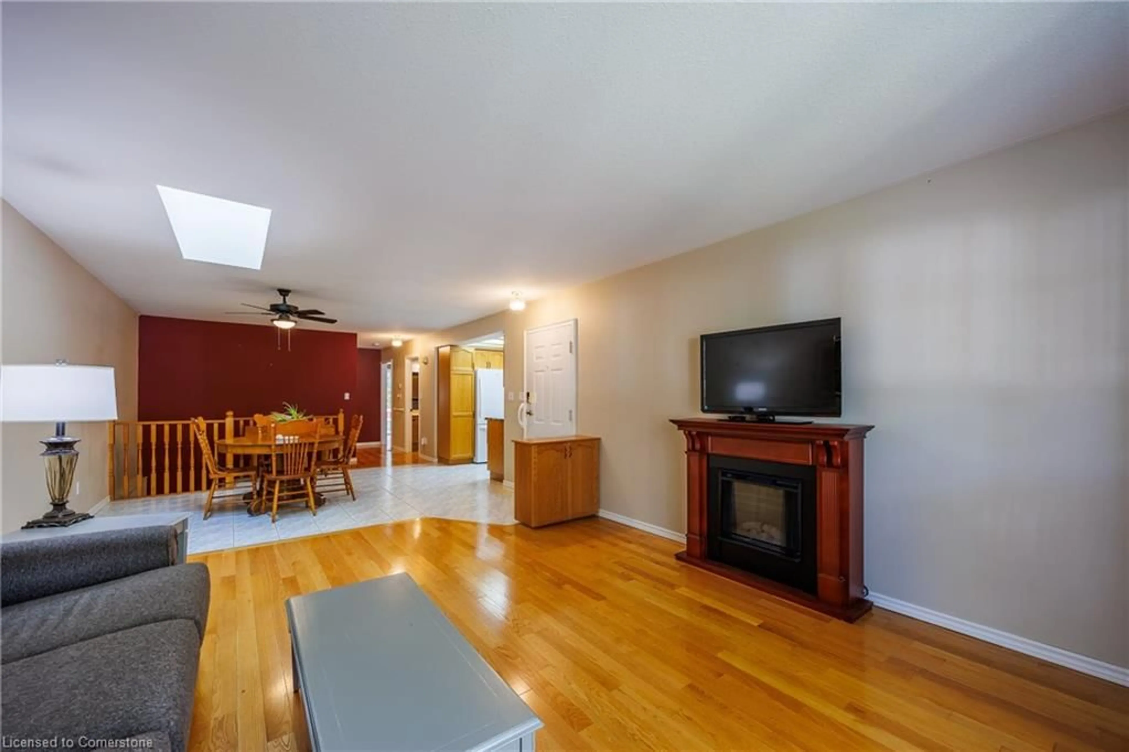 Living room with furniture, wood/laminate floor for 175 Victoria St #38, Simcoe Ontario N3Y 5L8