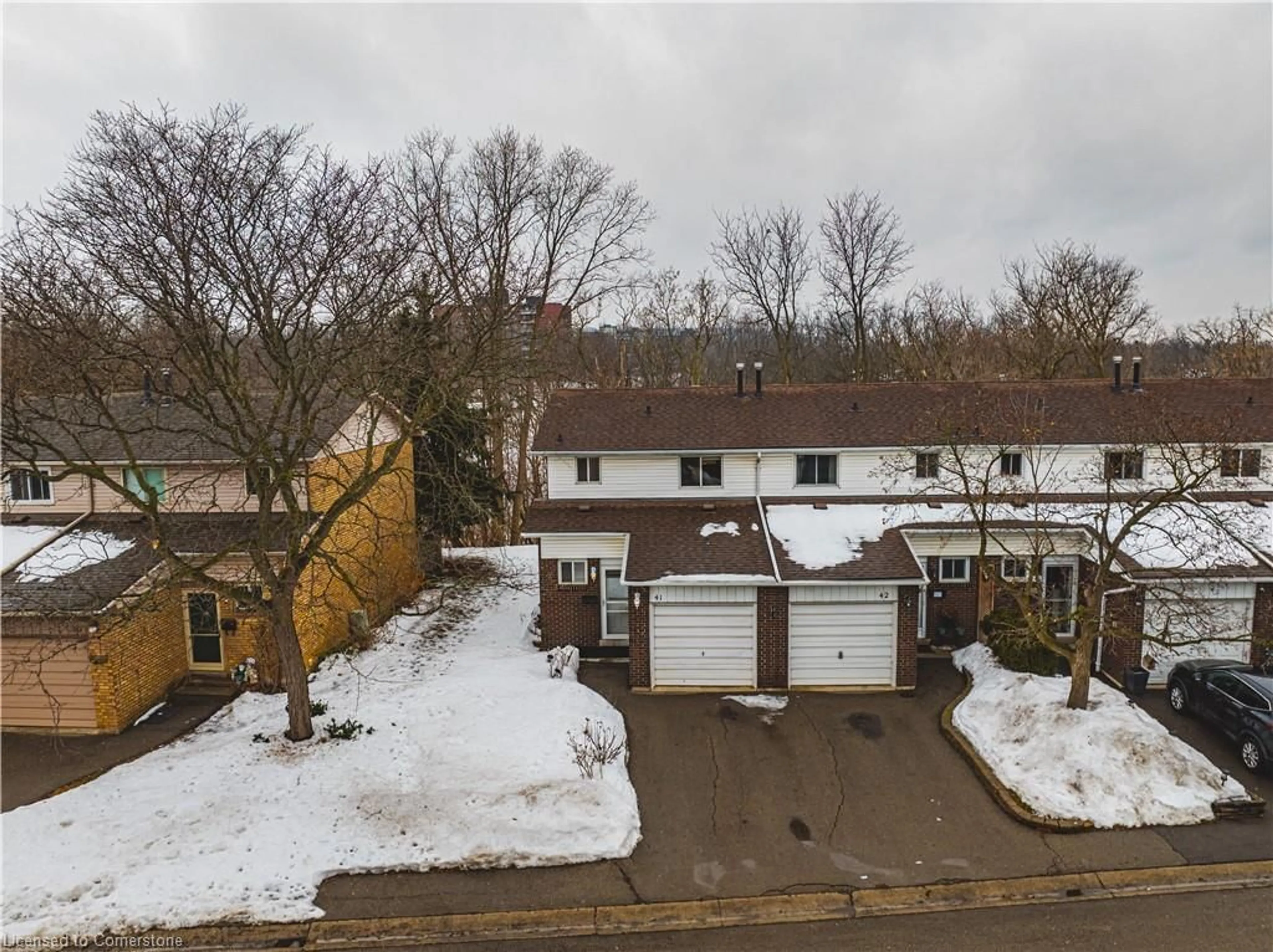 A pic from outside/outdoor area/front of a property/back of a property/a pic from drone, street for 100 Quigley Rd #41, Hamilton Ontario L8K 6J1