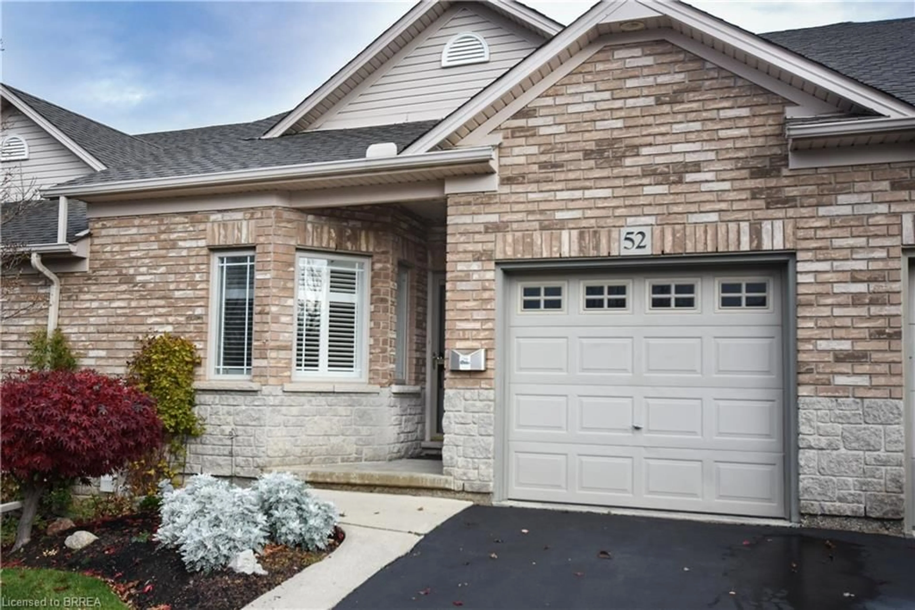 Home with brick exterior material, street for 10 Cobblestone Dr #52, Paris Ontario N3L 4G1