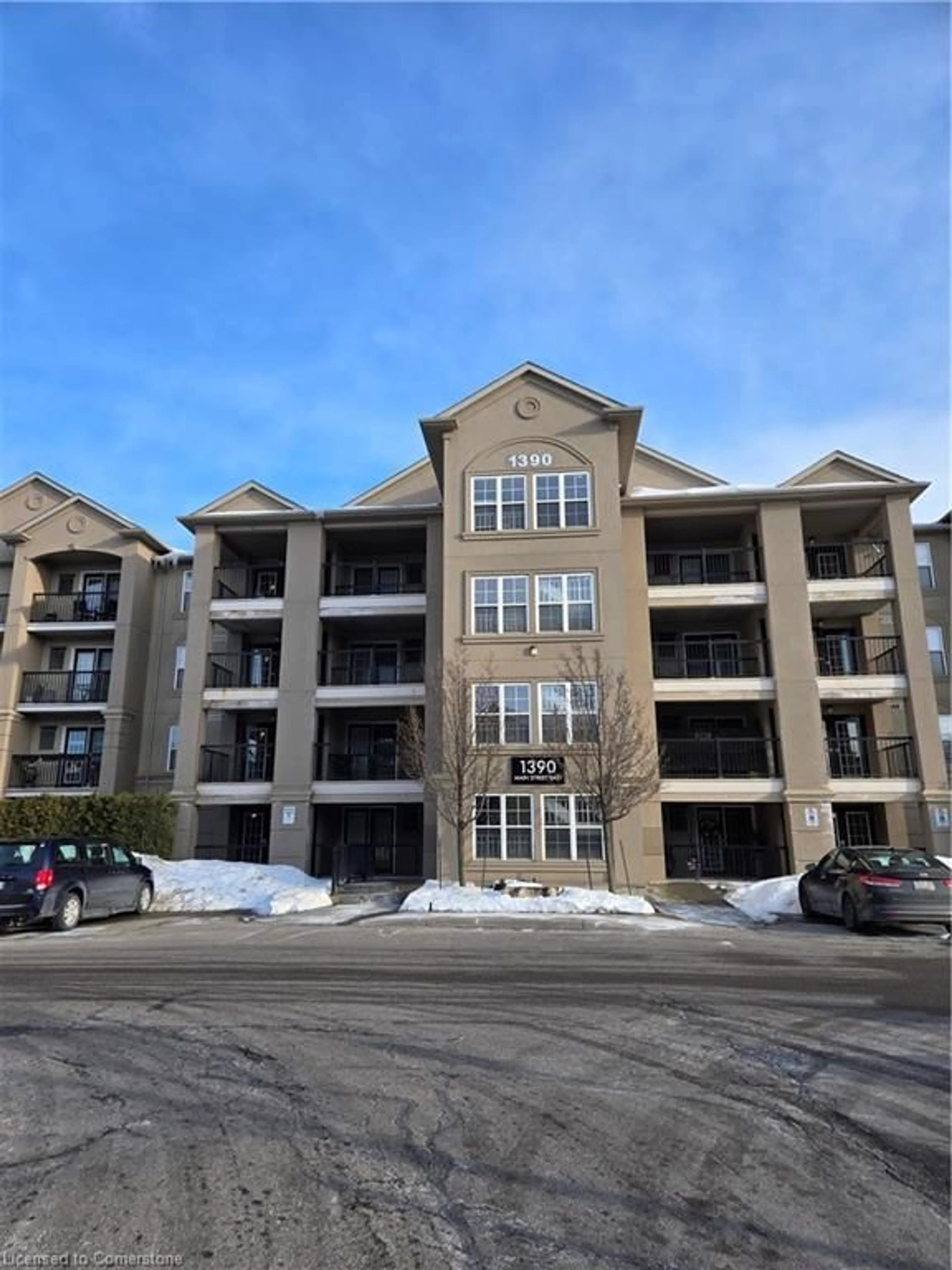 A pic from outside/outdoor area/front of a property/back of a property/a pic from drone, building for 1390 Main St #305, Milton Ontario L9T 7S9