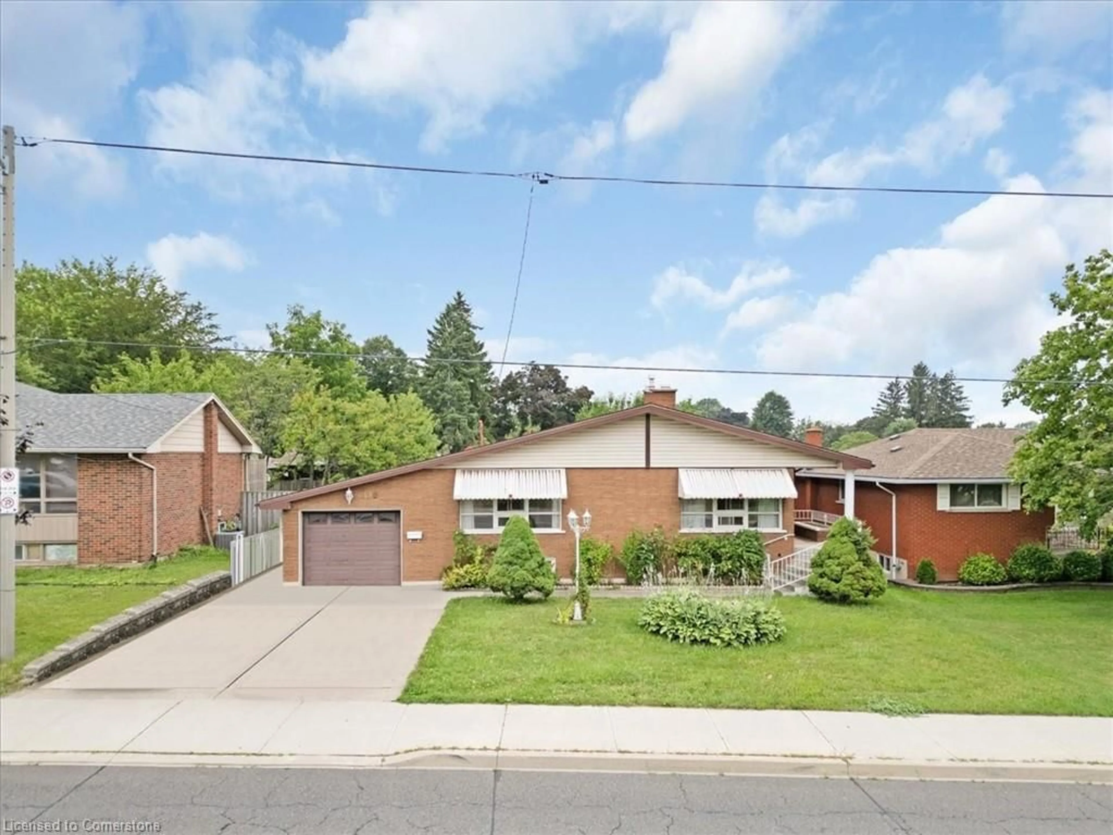 Home with brick exterior material, street for 420 West 5th St, Hamilton Ontario L9C 3P6