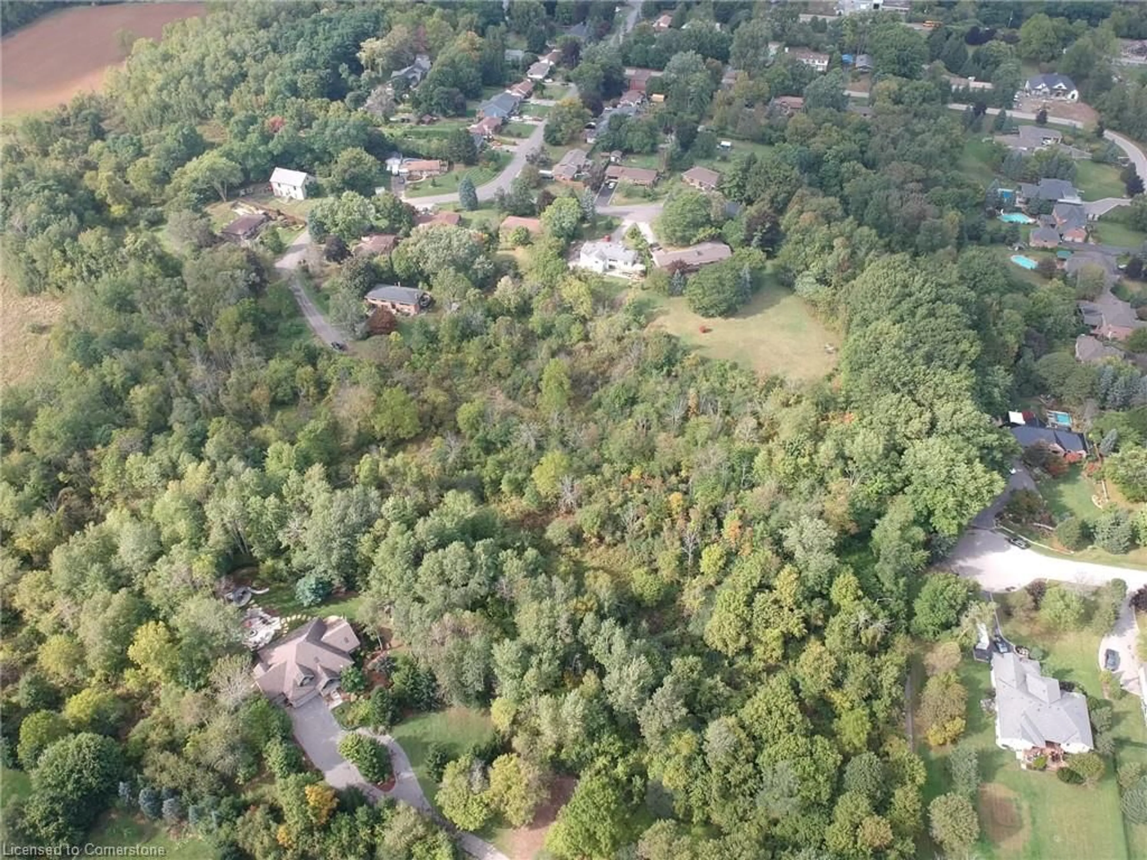 A pic from outside/outdoor area/front of a property/back of a property/a pic from drone, forest/trees view for 26 Marshboro Ave, Greensville Ontario L9H 5E1