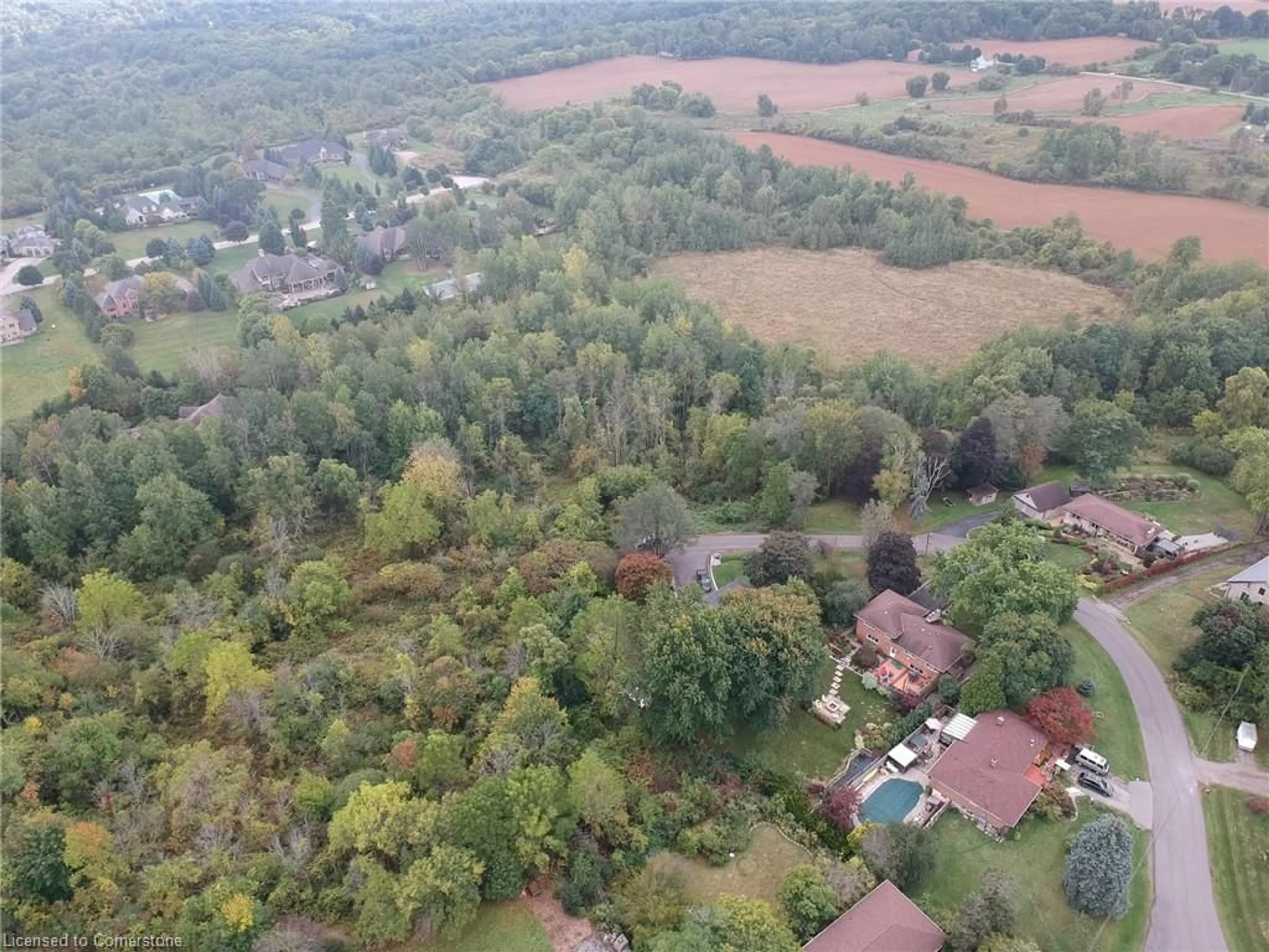 A pic from outside/outdoor area/front of a property/back of a property/a pic from drone, forest/trees view for 26 Marshboro Ave, Greensville Ontario L9H 5E1