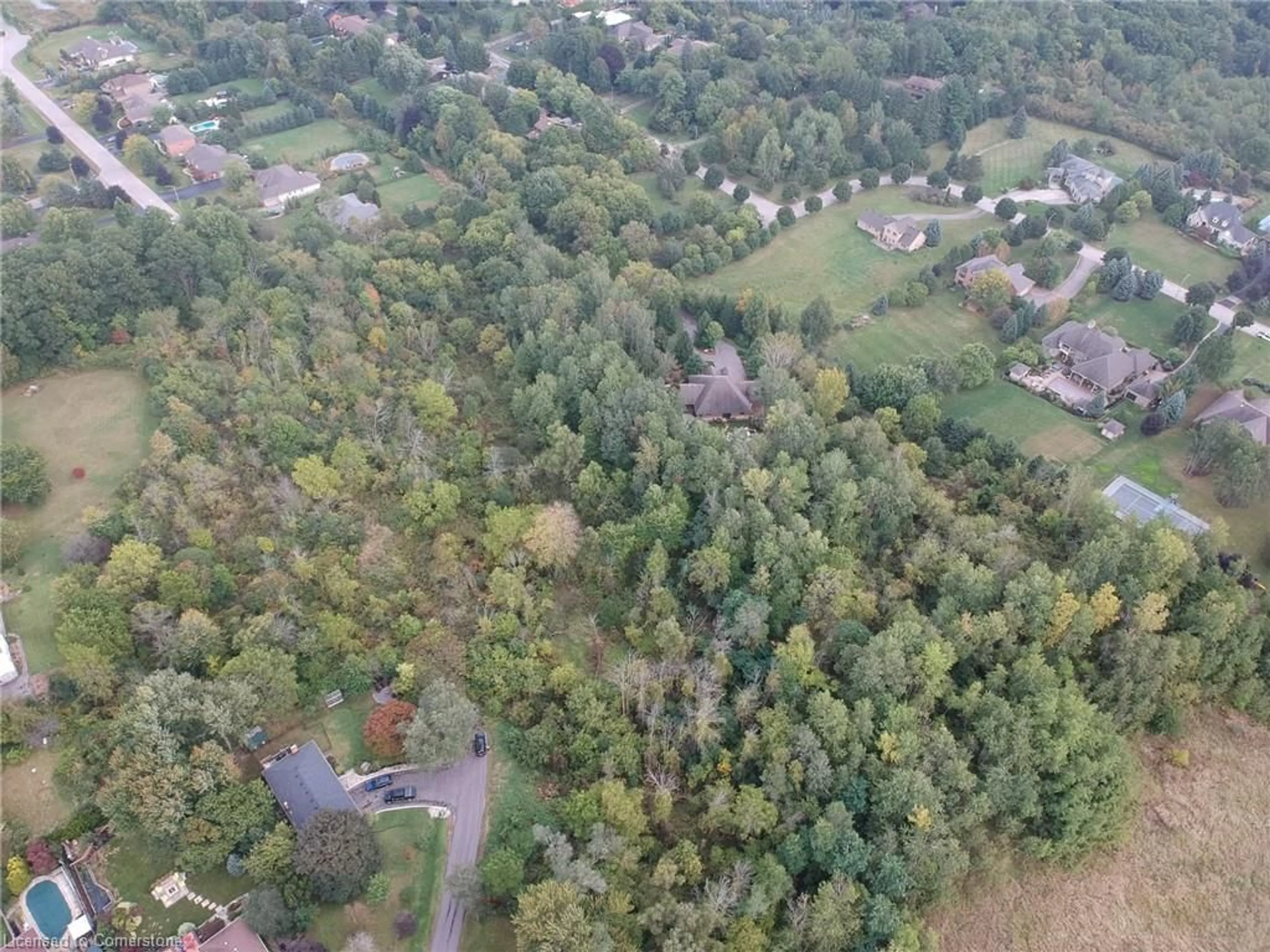 A pic from outside/outdoor area/front of a property/back of a property/a pic from drone, forest/trees view for 26 Marshboro Ave, Greensville Ontario L9H 5E1