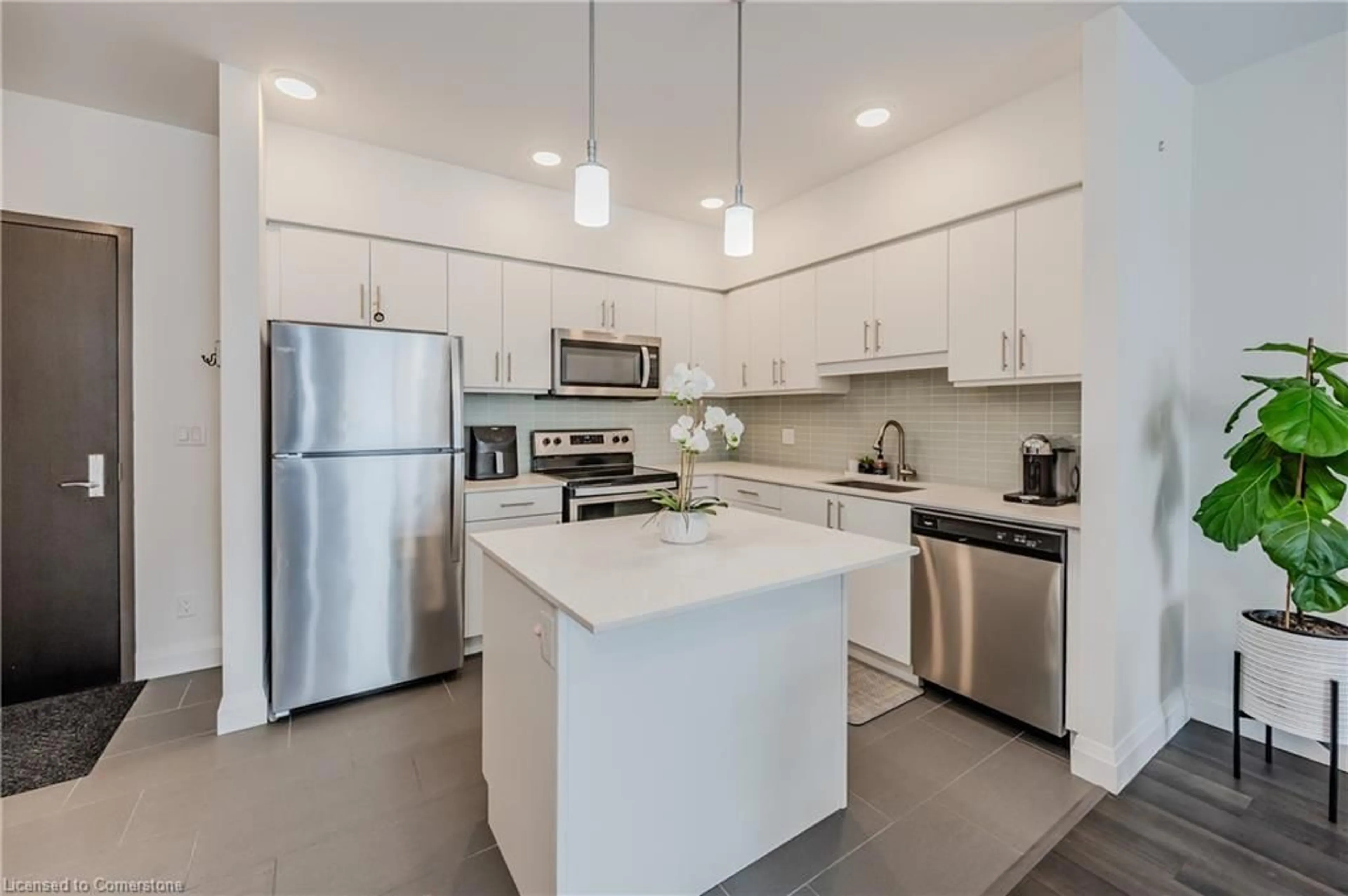 Open concept kitchen, ceramic/tile floor for 399 Queen St #313, Kitchener Ontario N2G 0C4