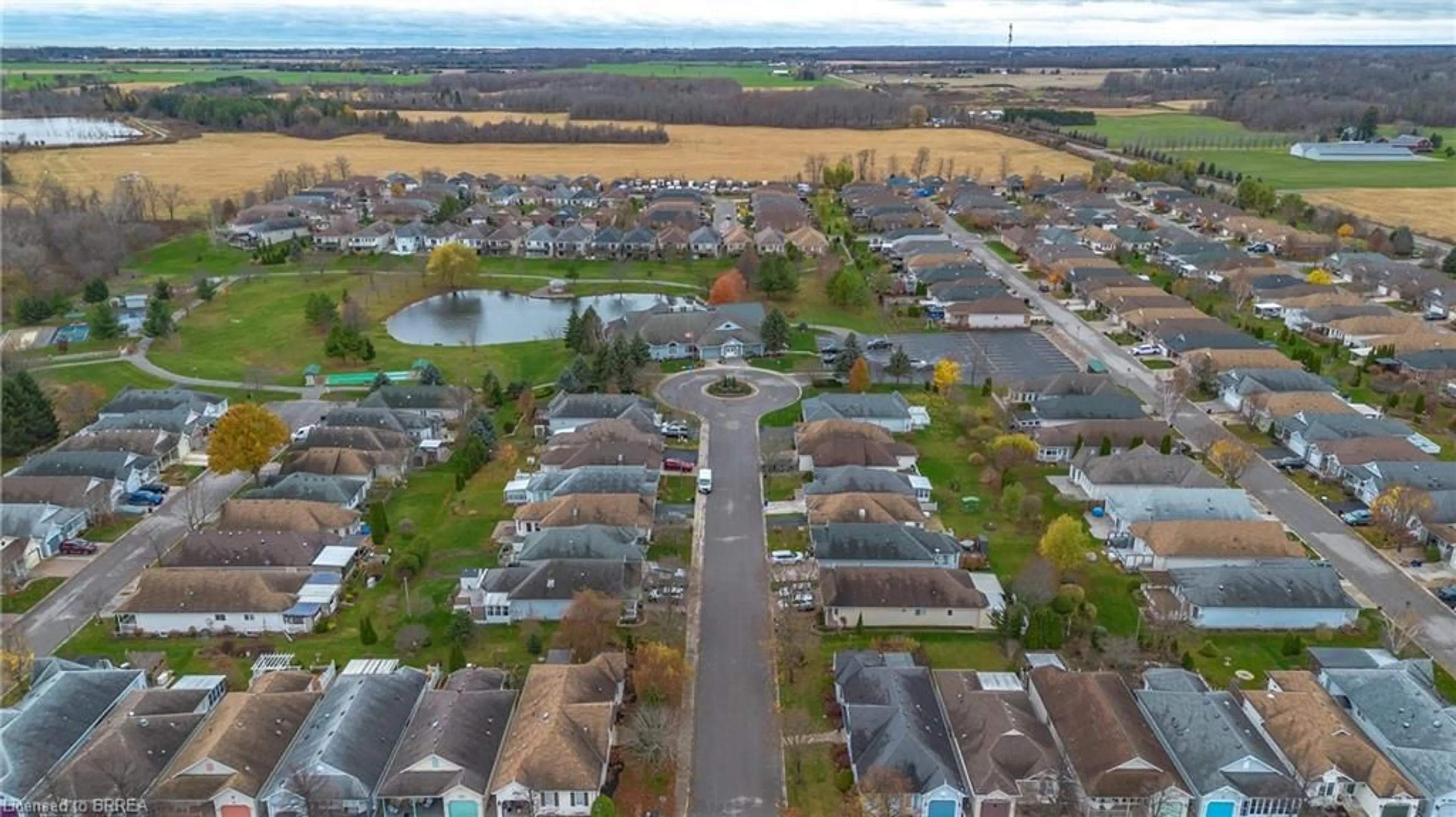 A pic from outside/outdoor area/front of a property/back of a property/a pic from drone, street for 21 Long Point Blvd, Port Rowan Ontario N0E 1M0