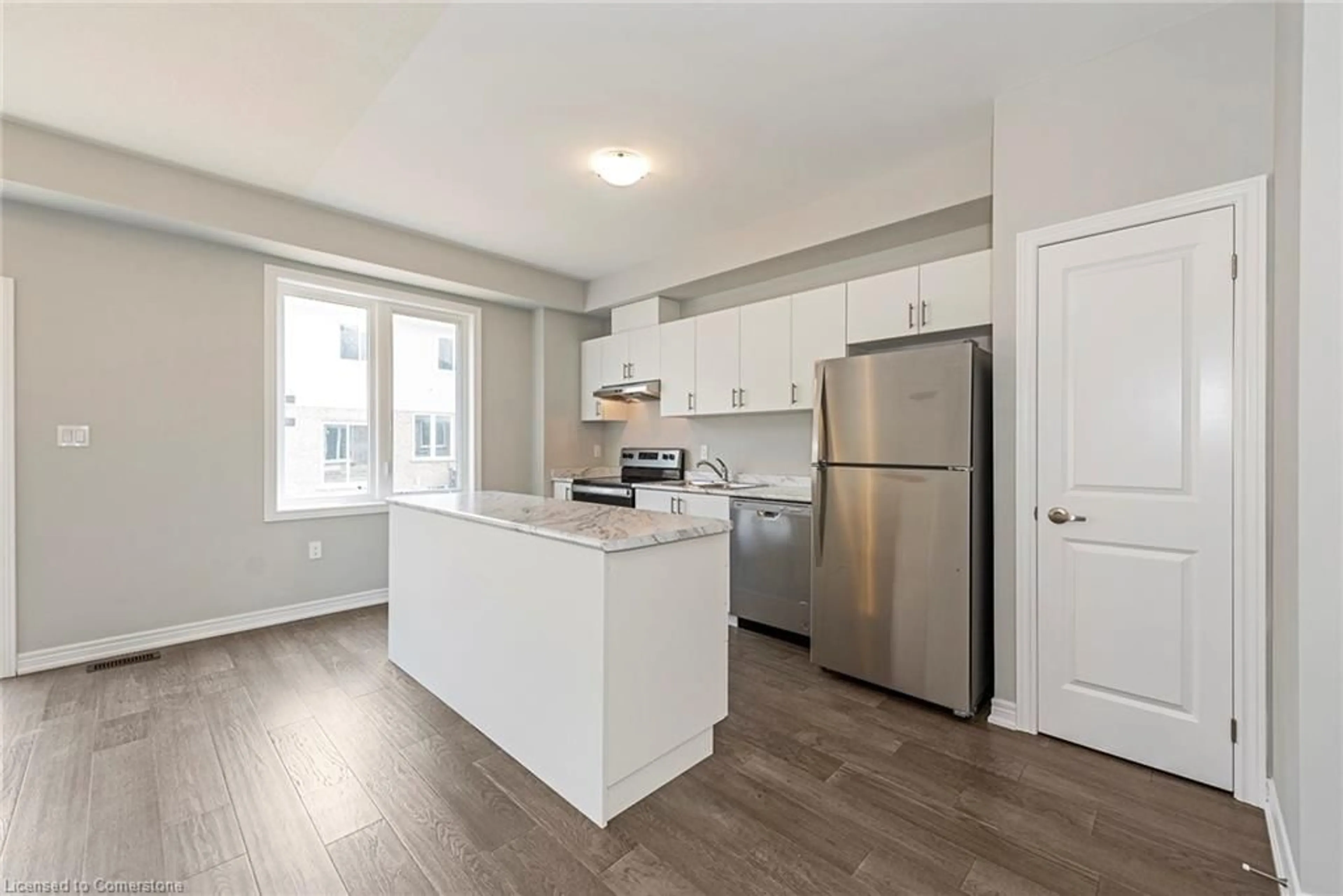 Open concept kitchen, wood/laminate floor for 39 Linden Park Lane, Hamilton Ontario L9A 1Y1