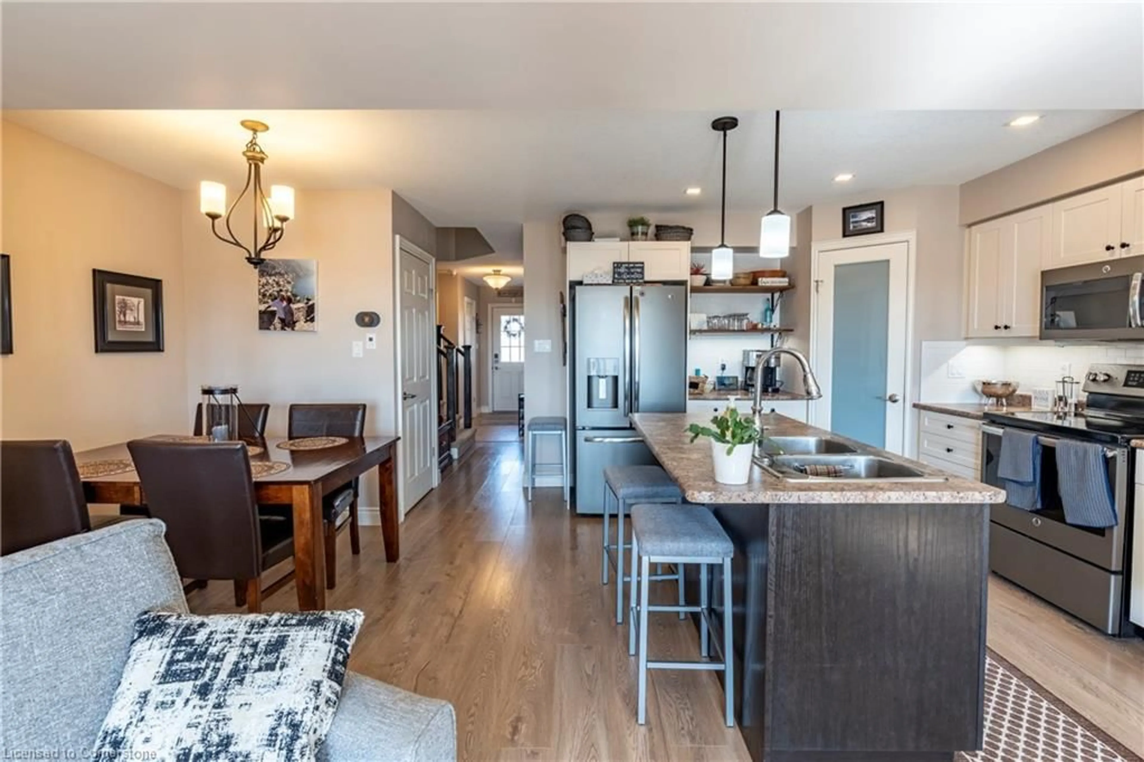 Open concept kitchen, wood/laminate floor for 175 Ingersoll St #22, Ingersoll Ontario N5C 0B9