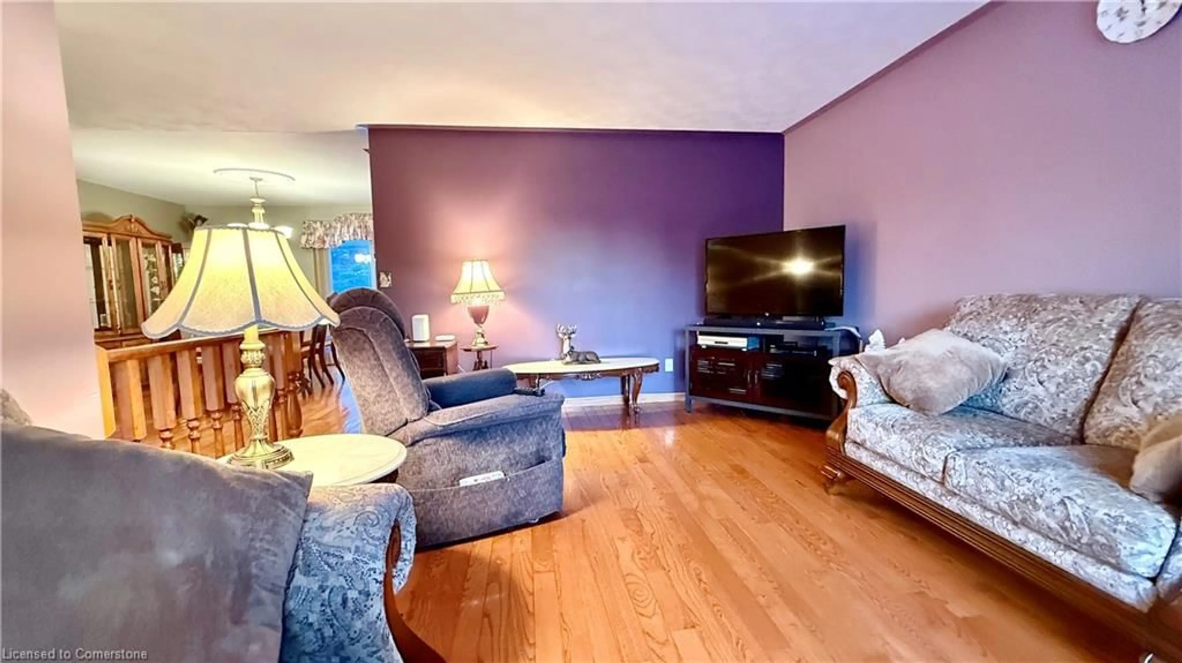 Living room with furniture, wood/laminate floor for 159 Duncombe Rd, Waterford Ontario N0E 1Y0