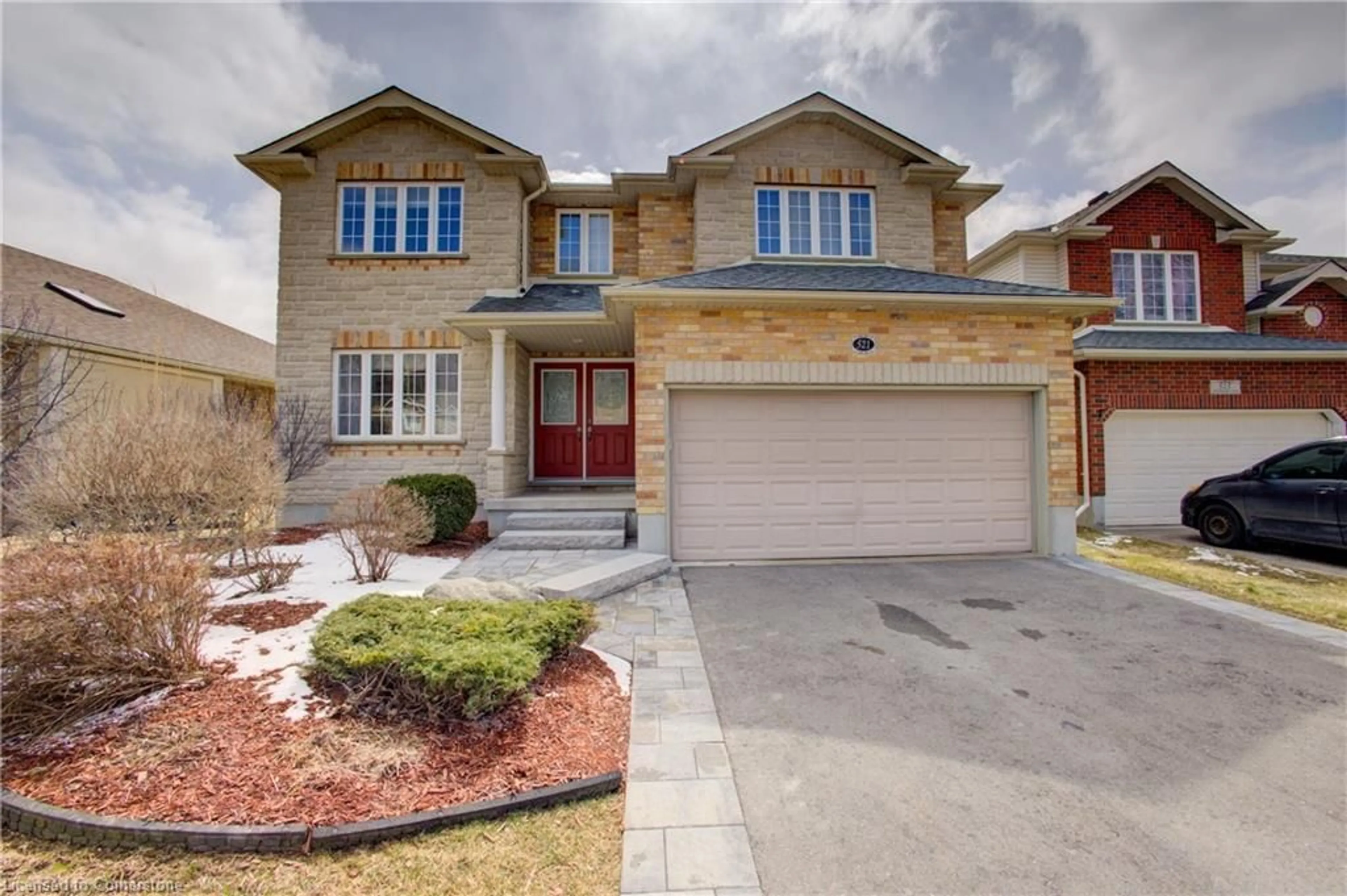 Home with brick exterior material, street for 521 Starboard Cres, Waterloo Ontario N2K 4G5