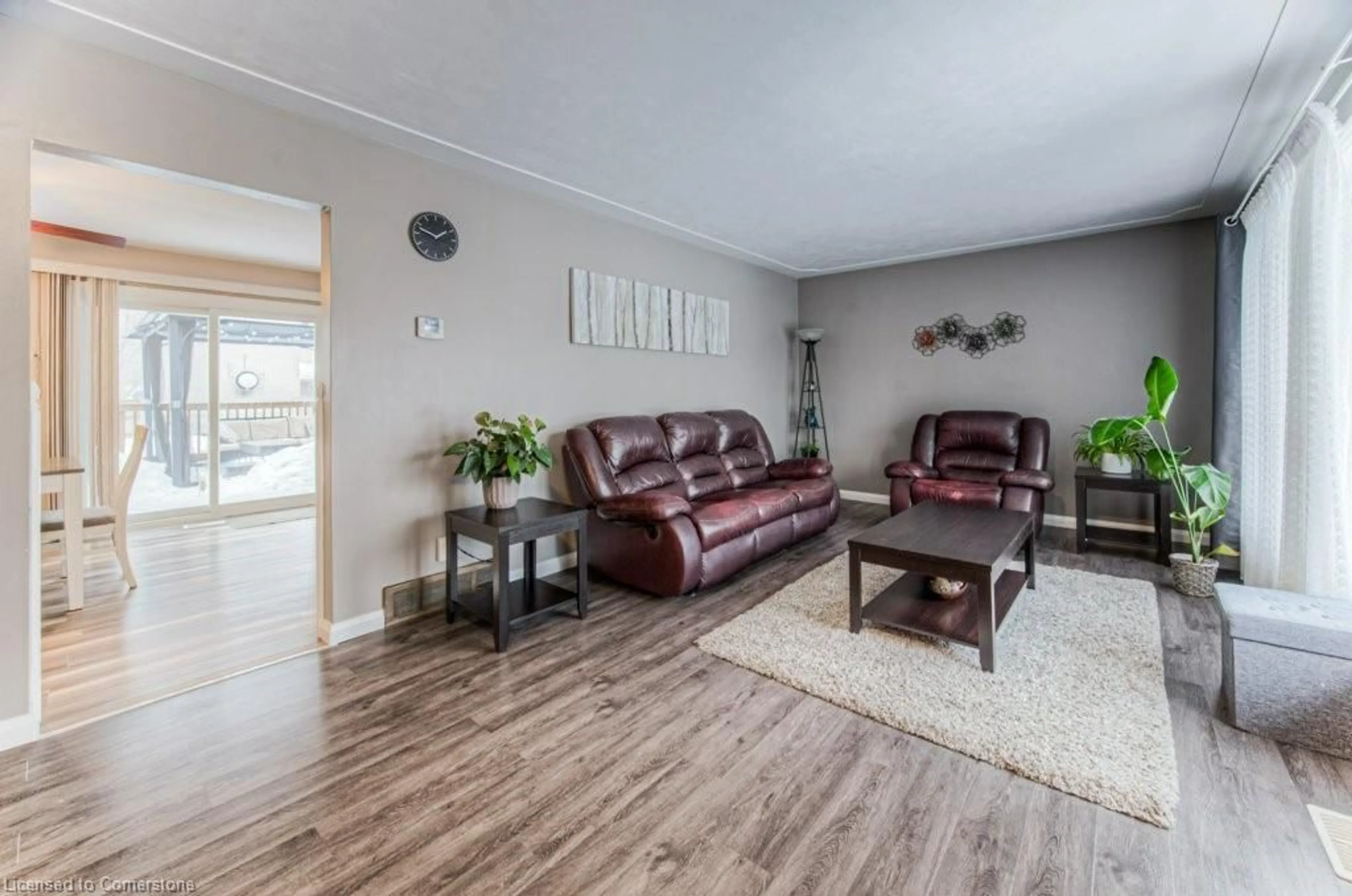 Living room with furniture, wood/laminate floor for 12 Snyder Ave, Elmira Ontario N3B 2B1