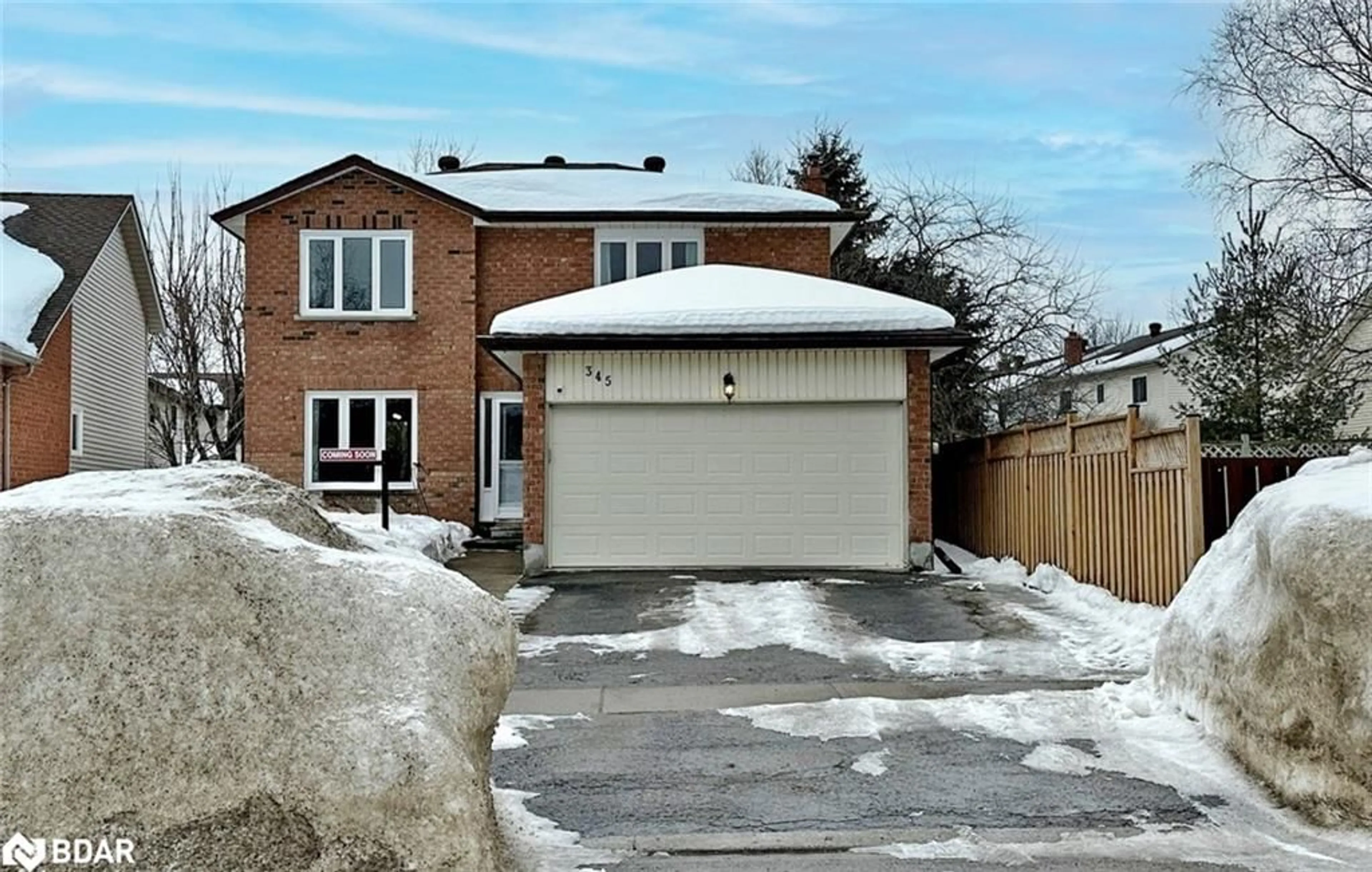 Home with brick exterior material, street for 345 Hickling Trail, Barrie Ontario L4M 5Z6