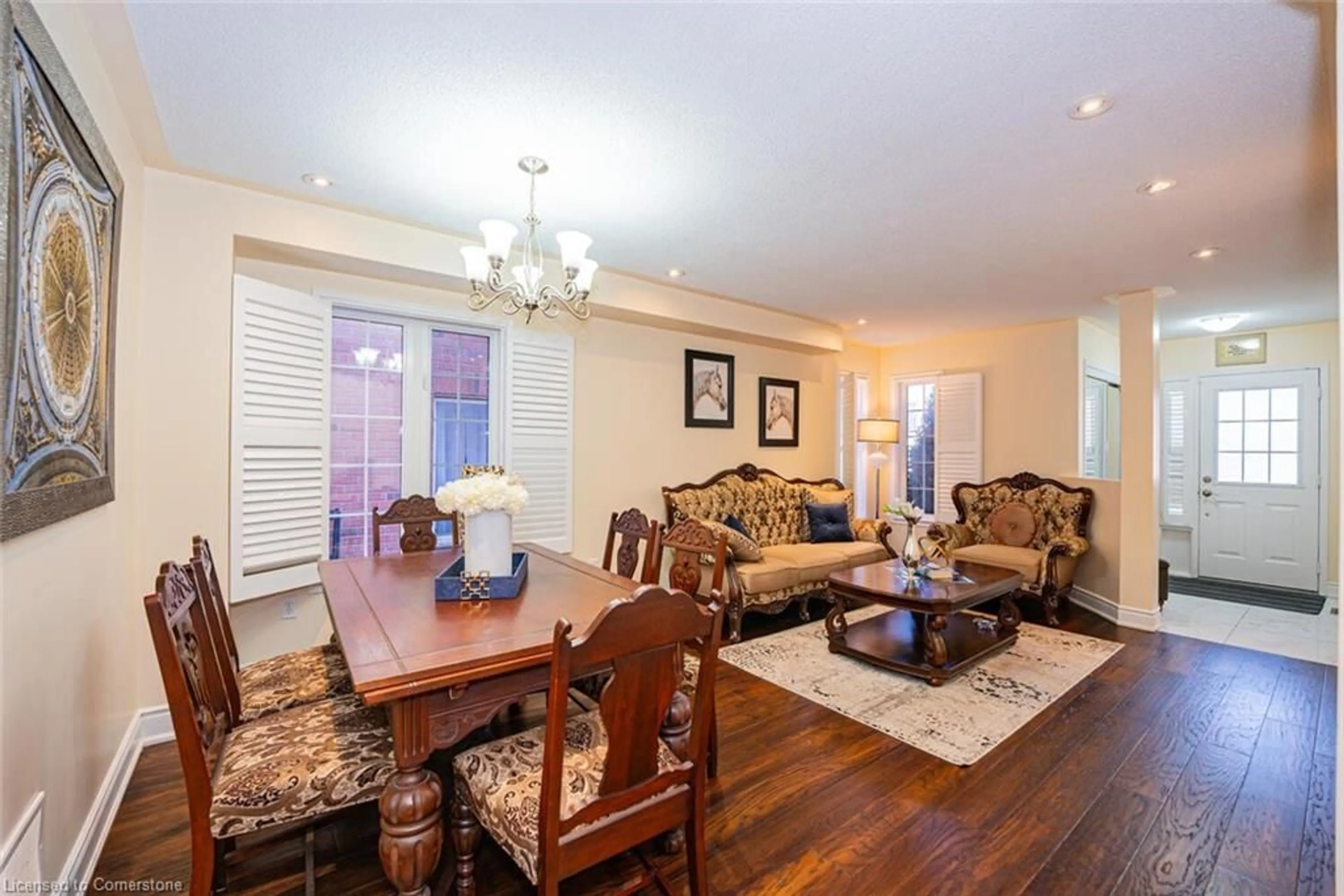 Living room with furniture, wood/laminate floor for 12 Spencer Dr, Brampton Ontario L7A 2A4