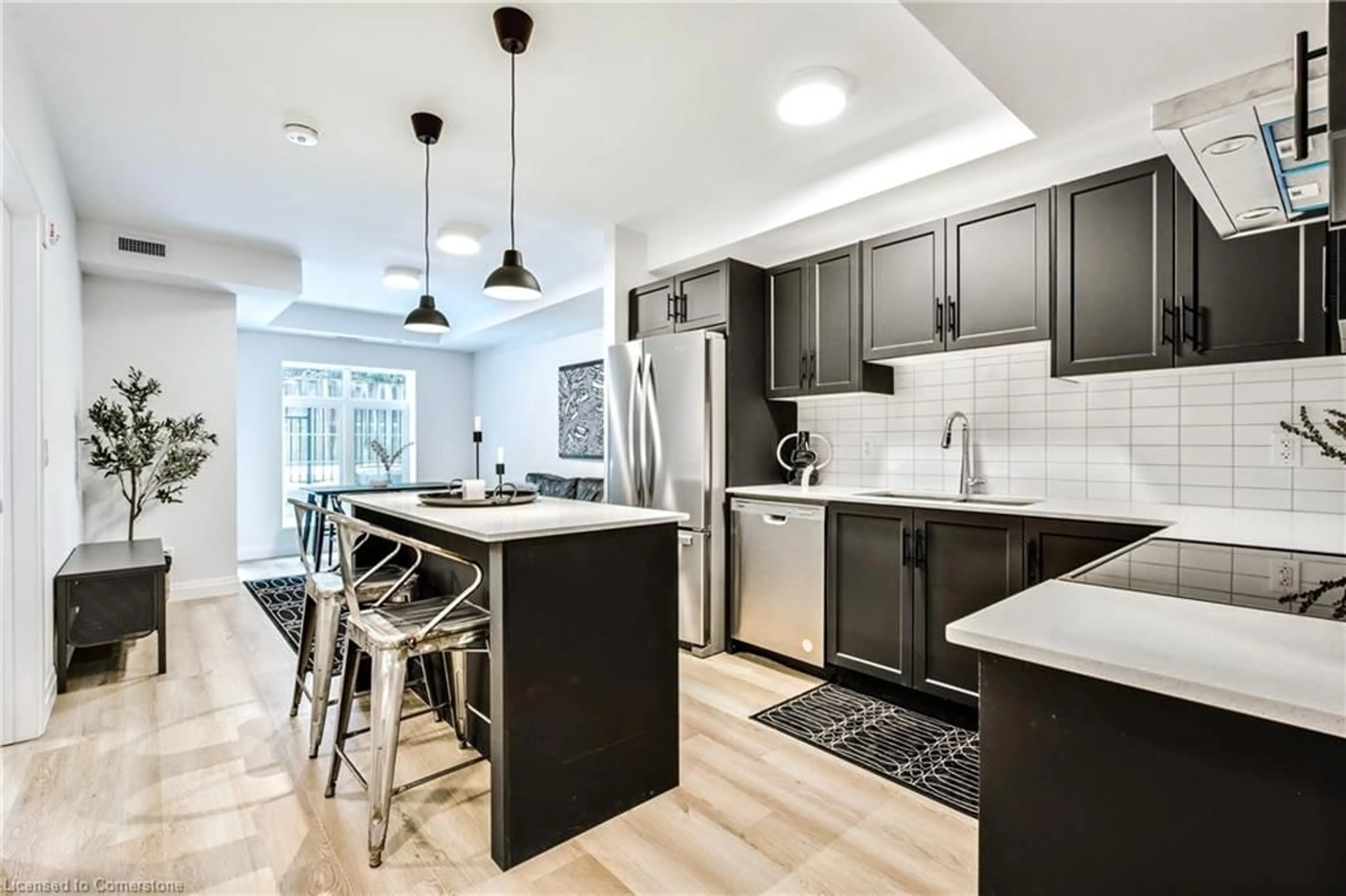 Open concept kitchen, ceramic/tile floor for 153 Wilson St #106, Ancaster Ontario L9G 1N4