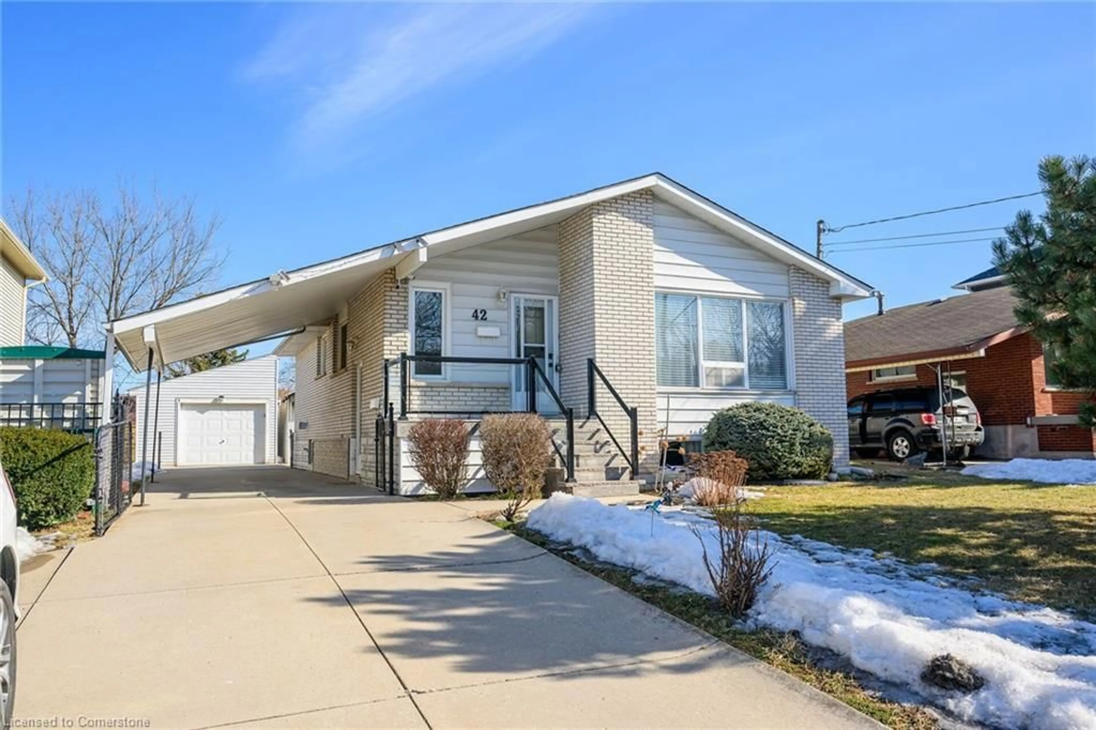 Home with vinyl exterior material, street for 42 Warwick Rd, Hamilton Ontario L8E 1Y6