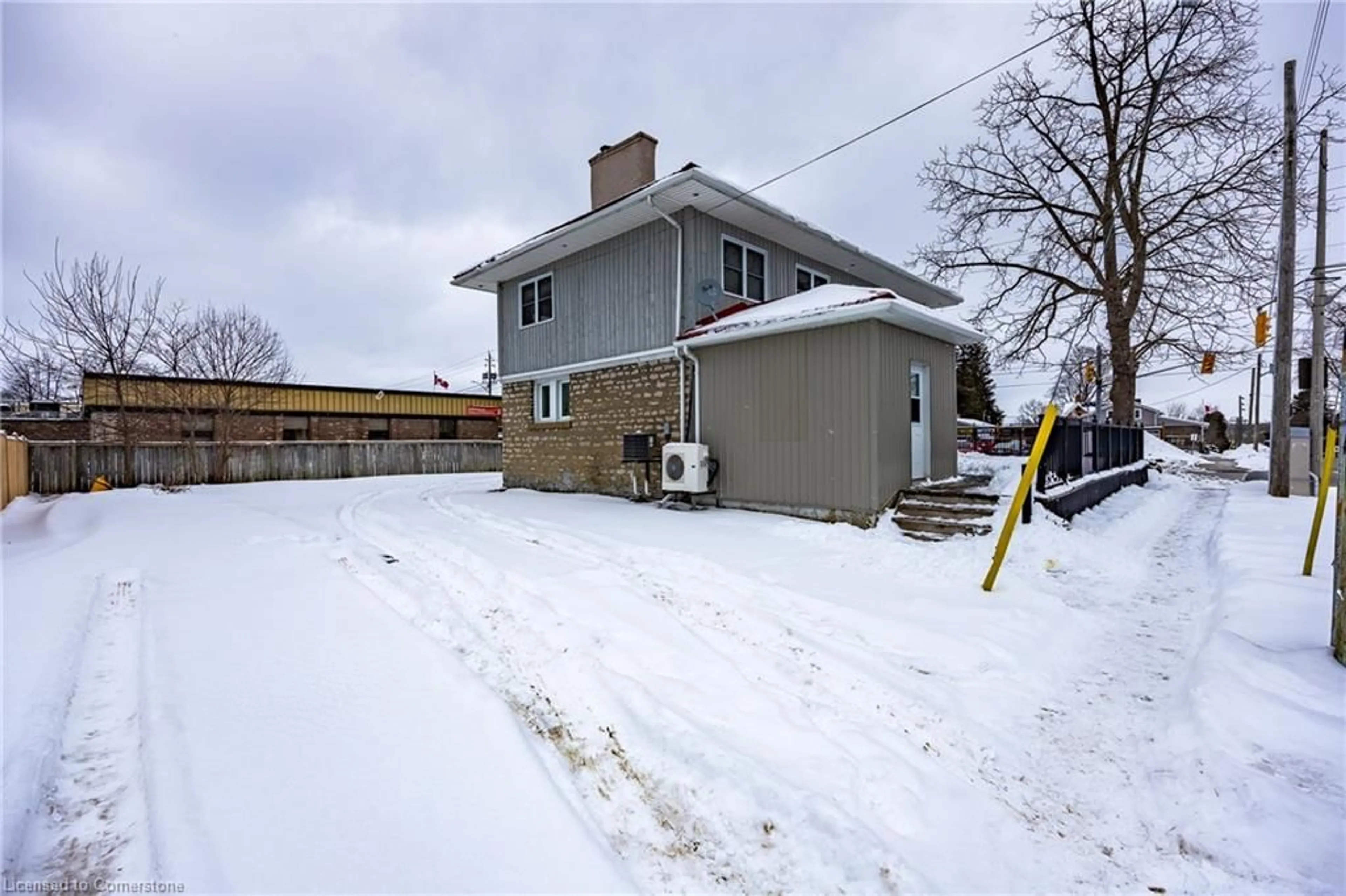 A pic from outside/outdoor area/front of a property/back of a property/a pic from drone, street for 401 Main St, Port Dover Ontario N0A 1N0