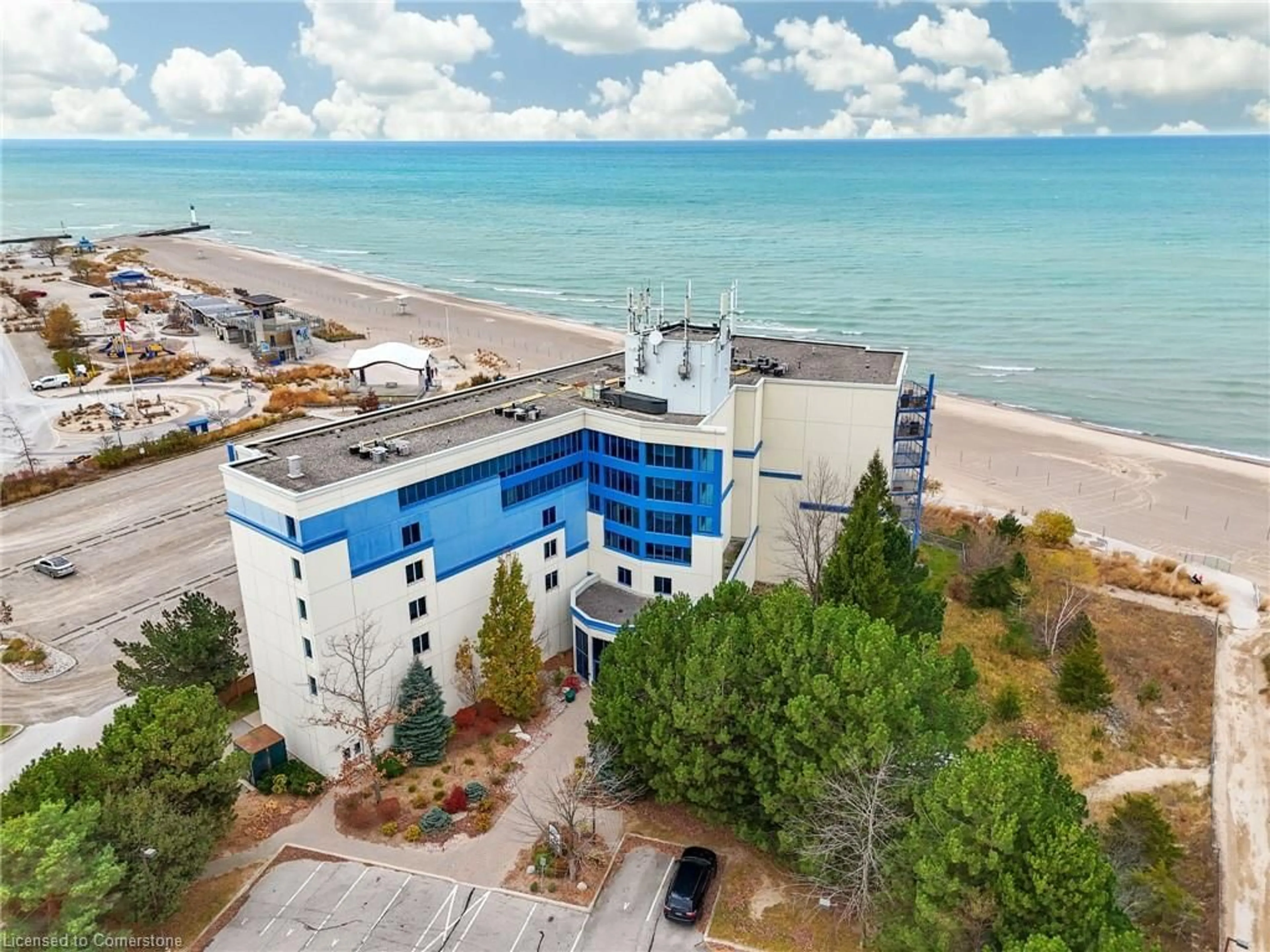 A pic from outside/outdoor area/front of a property/back of a property/a pic from drone, building for 9 Pine St #202, Grand Bend Ontario N0M 1T0