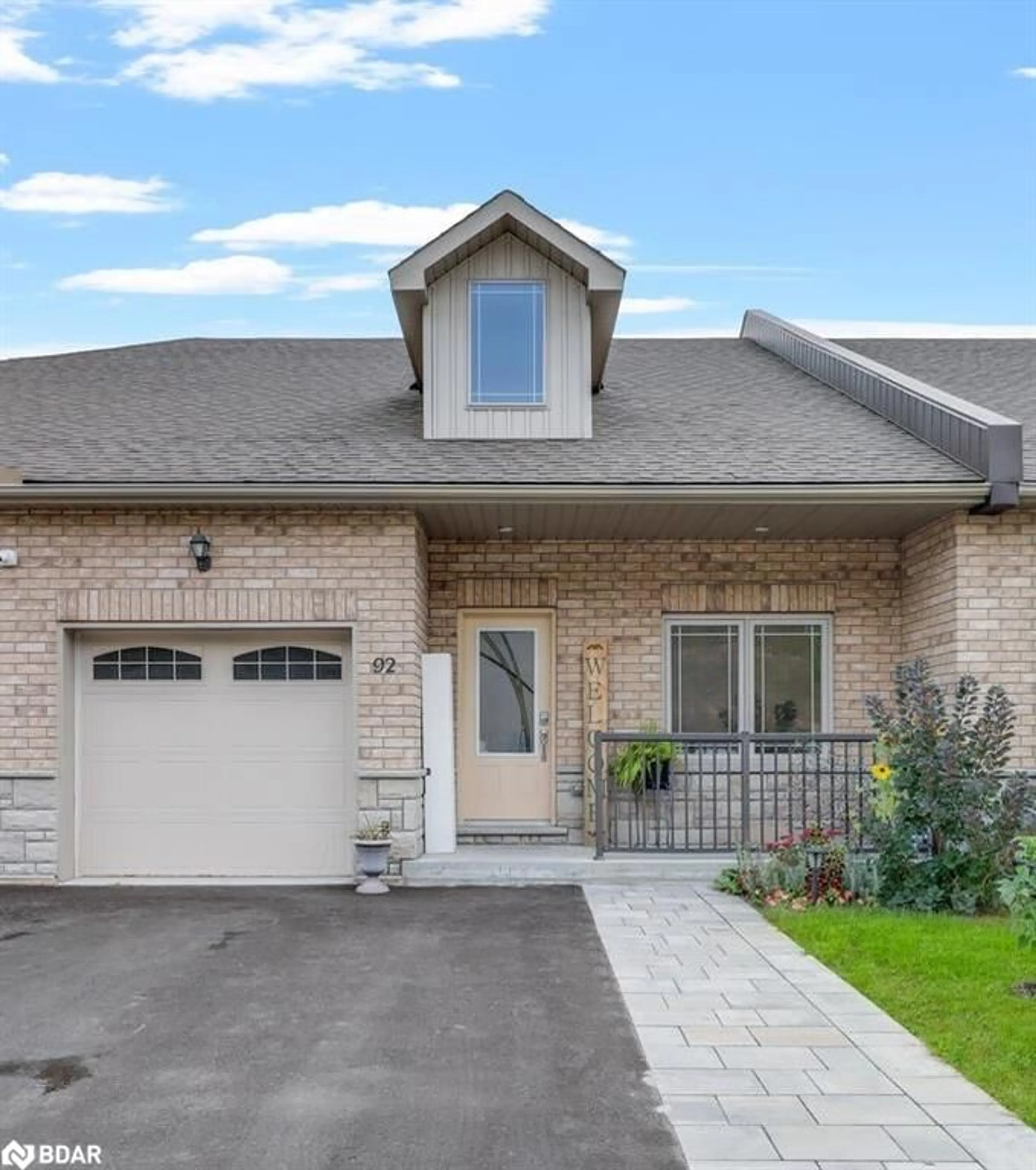 Home with brick exterior material, street for 92 Lily Dr, Orillia Ontario L3V 7A8