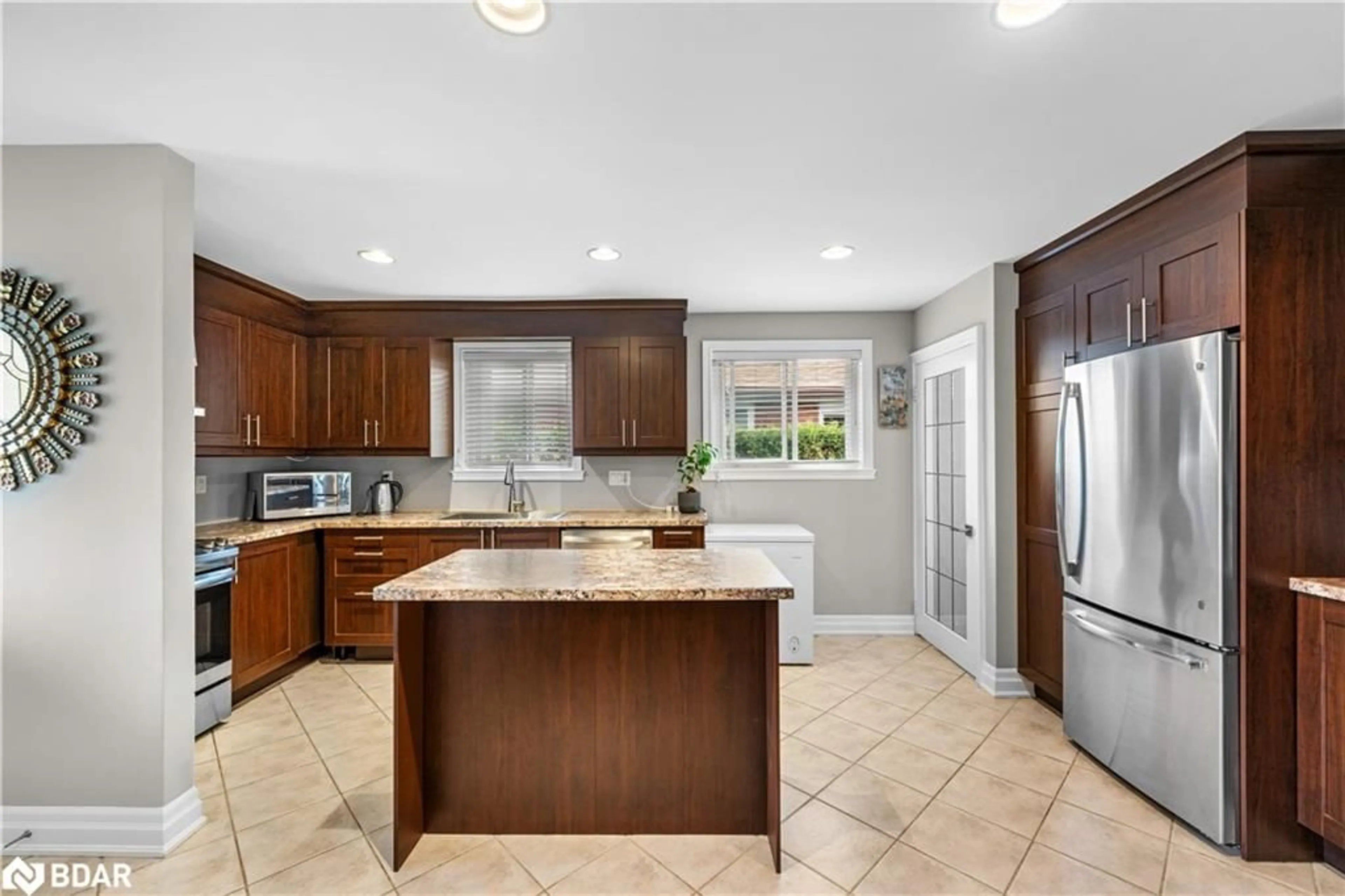 Open concept kitchen, ceramic/tile floor for 758 Annamore Rd, Peel Ontario L4Y 2V7