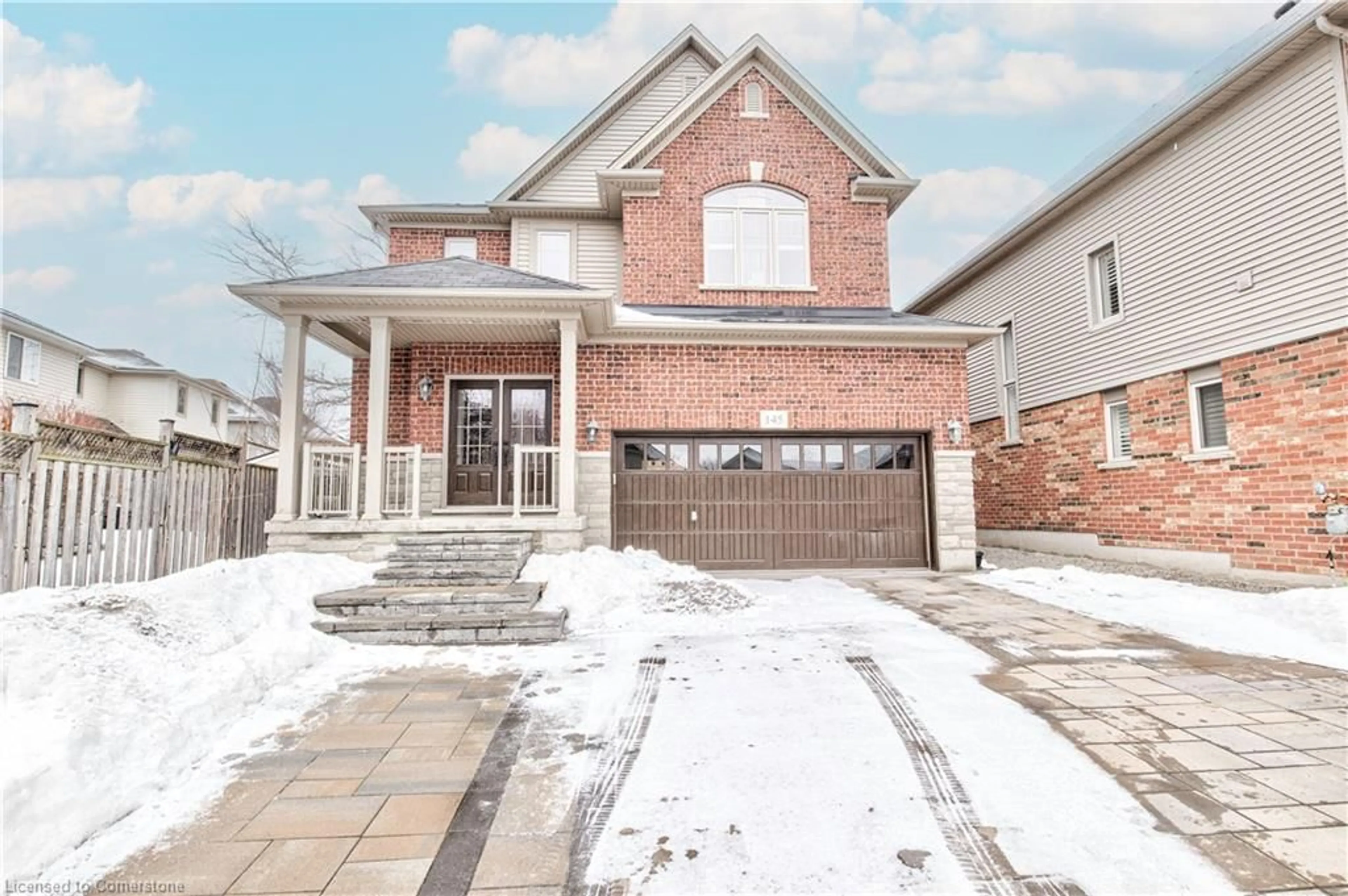 Home with brick exterior material, street for 145 Redtail Dr, Kitchener Ontario N2K 4J5