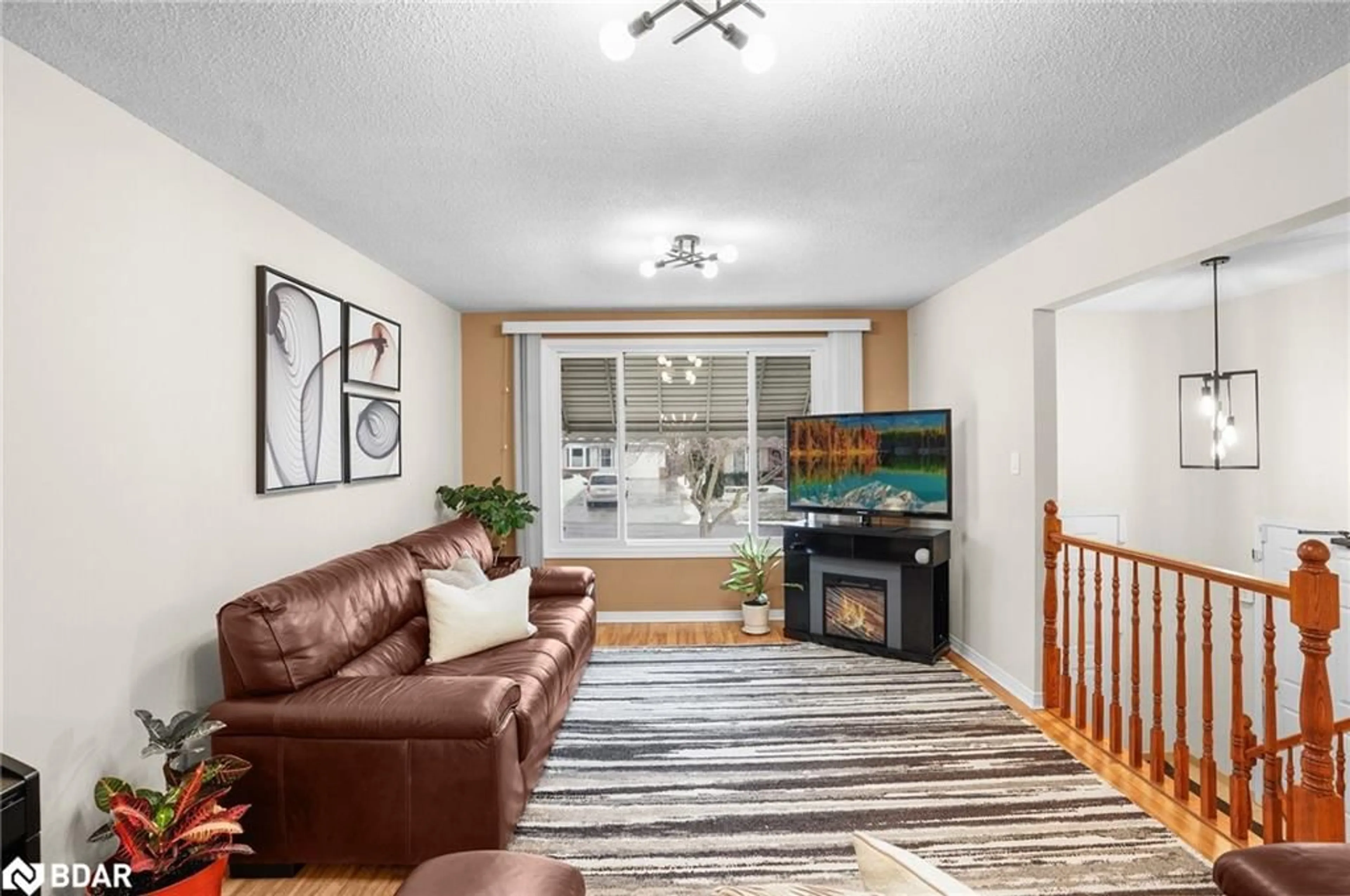 Living room with furniture, unknown for 44 The Meadows, St. Catharines Ontario L2N 7L1