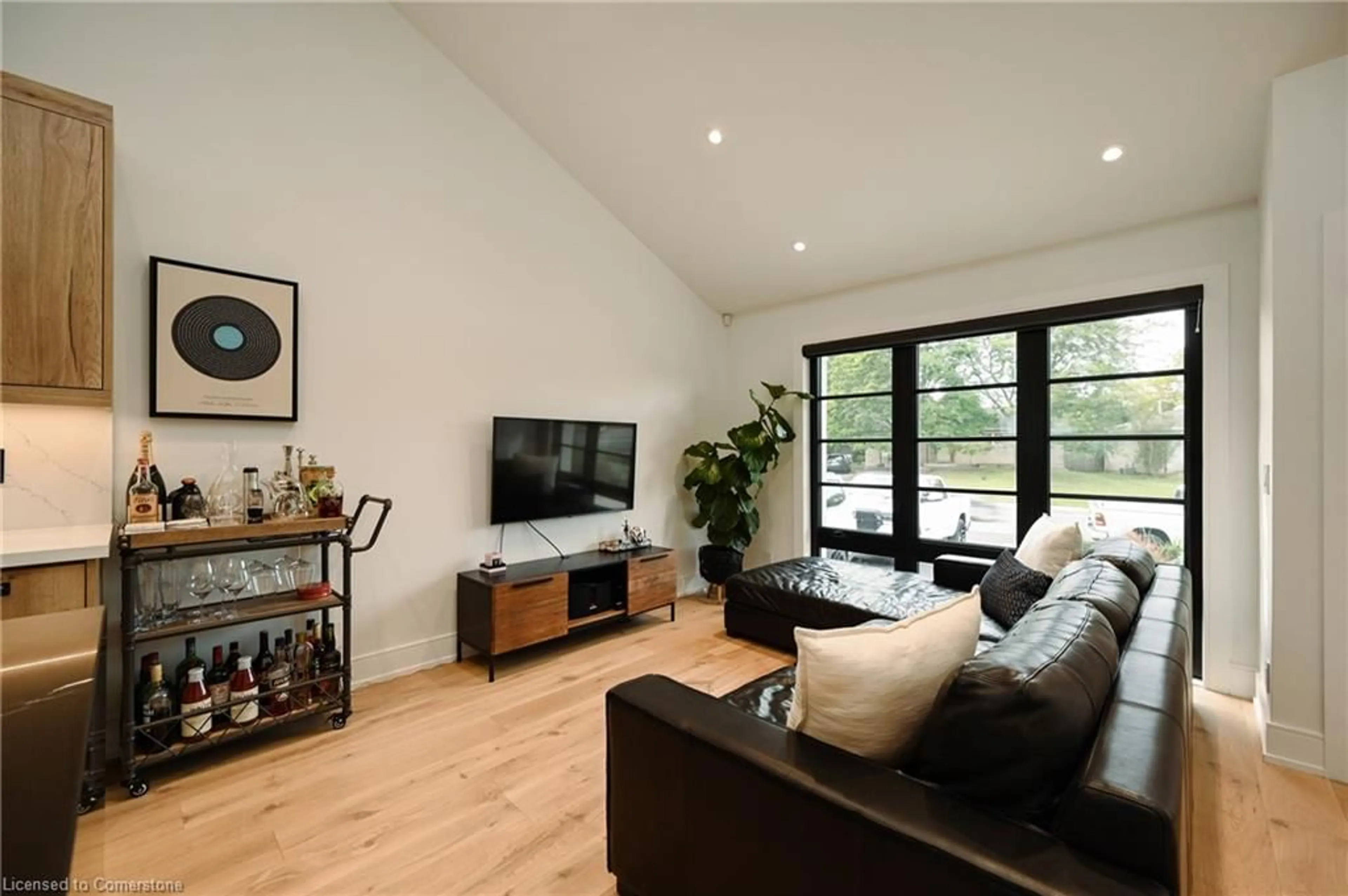 Living room with furniture, wood/laminate floor for 1344 Bridge Rd, Oakville Ontario L6L 2C7