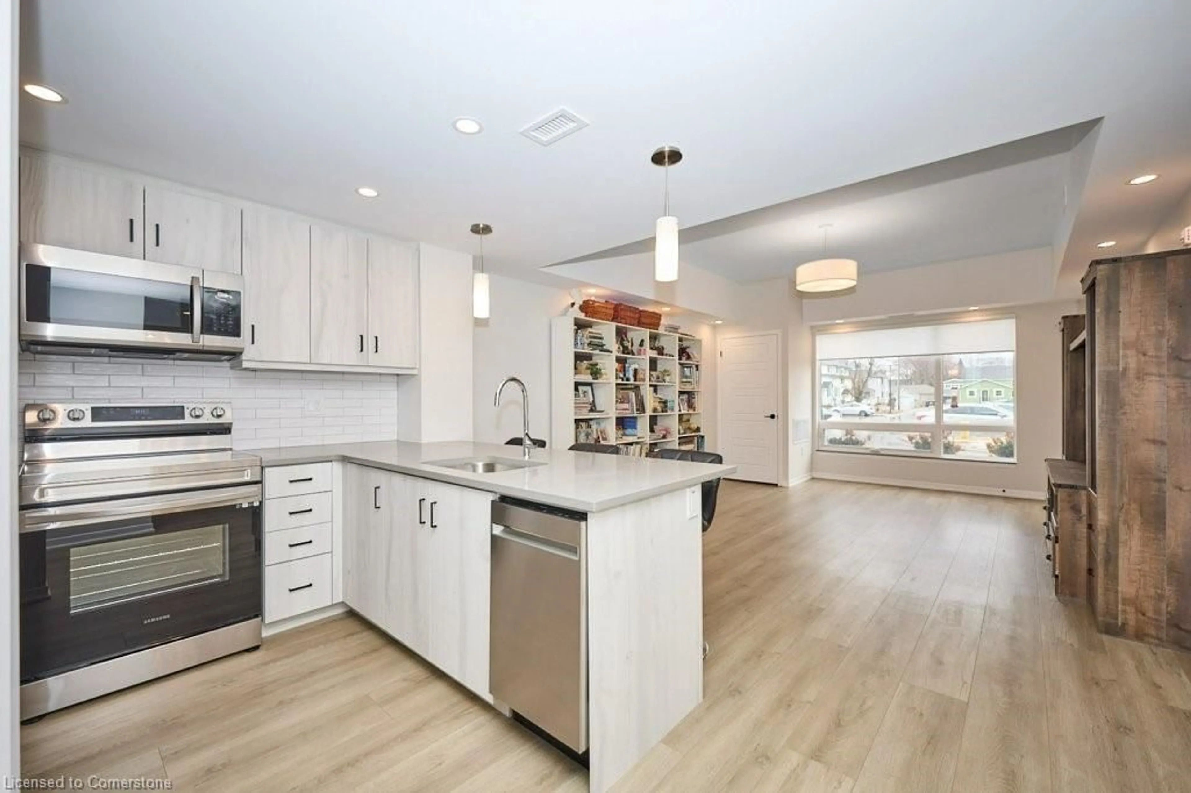 Open concept kitchen, ceramic/tile floor for 3998 Victoria Ave #103, Vineland Ontario L0R 2C0