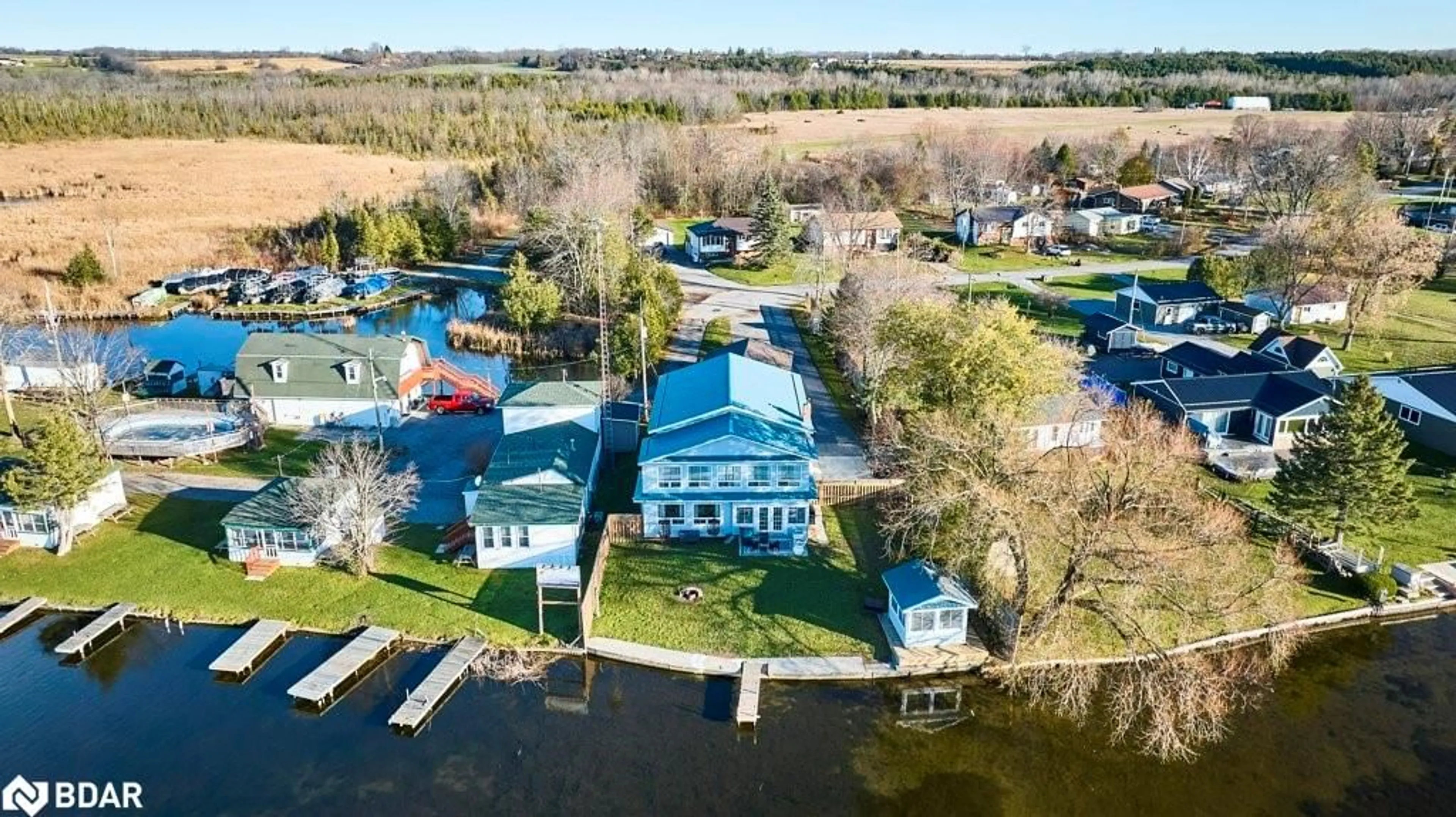 A pic from outside/outdoor area/front of a property/back of a property/a pic from drone, water/lake/river/ocean view for 81 Laird Dr, Lindsay Twp Ontario K9V 4R6