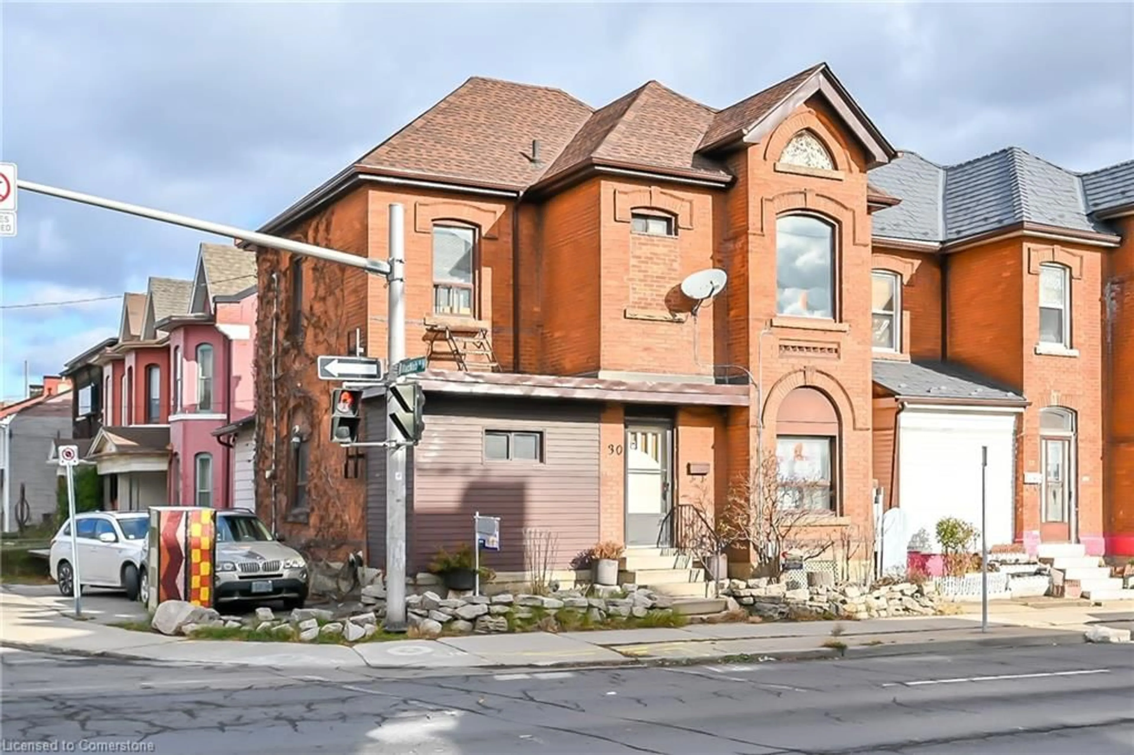 Home with brick exterior material, street for 30 Cannon St #DUPLEX, Hamilton Ontario L8R 2B3