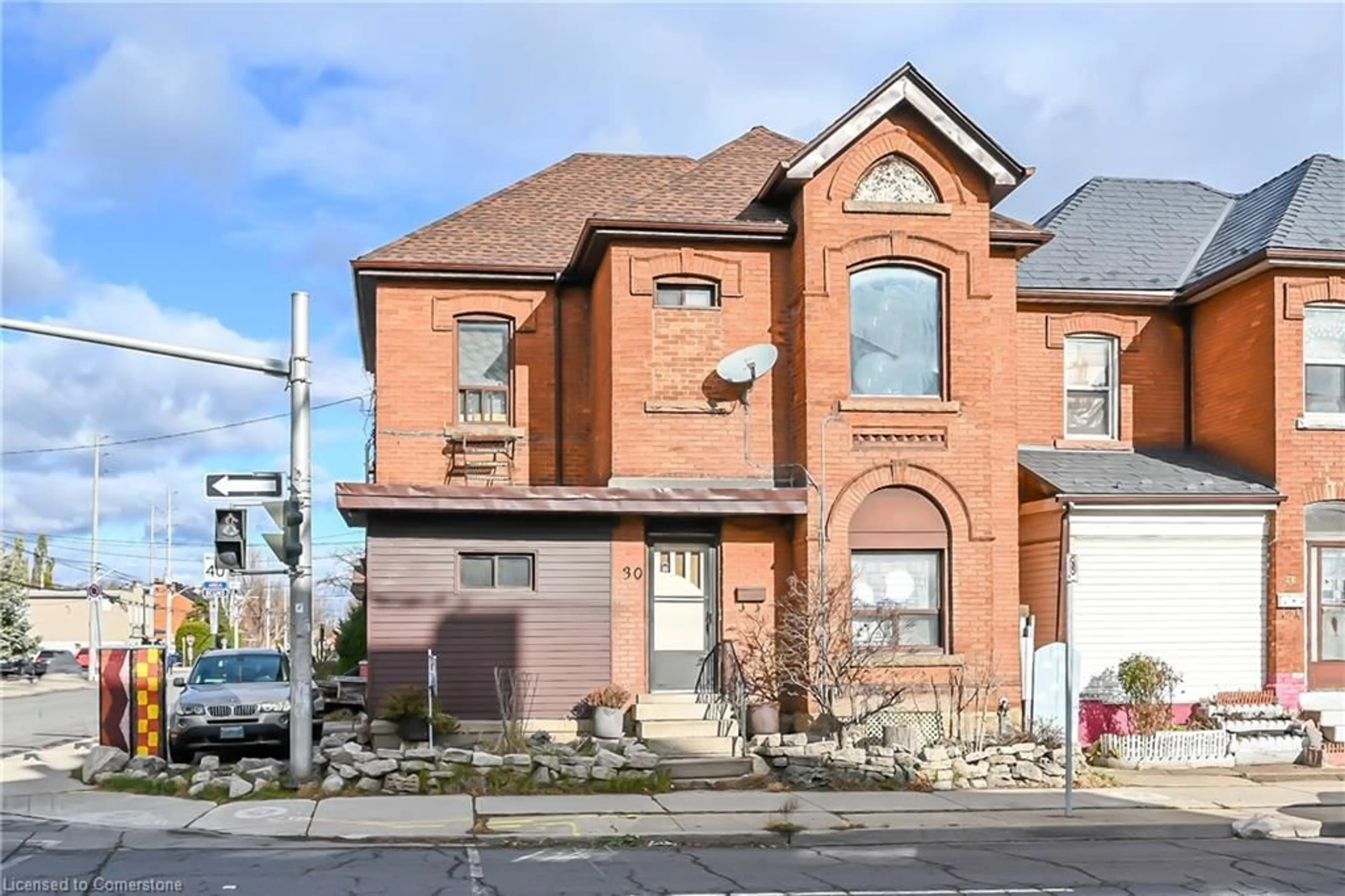 Home with brick exterior material, street for 30 Cannon St #DUPLEX, Hamilton Ontario L8R 2B3