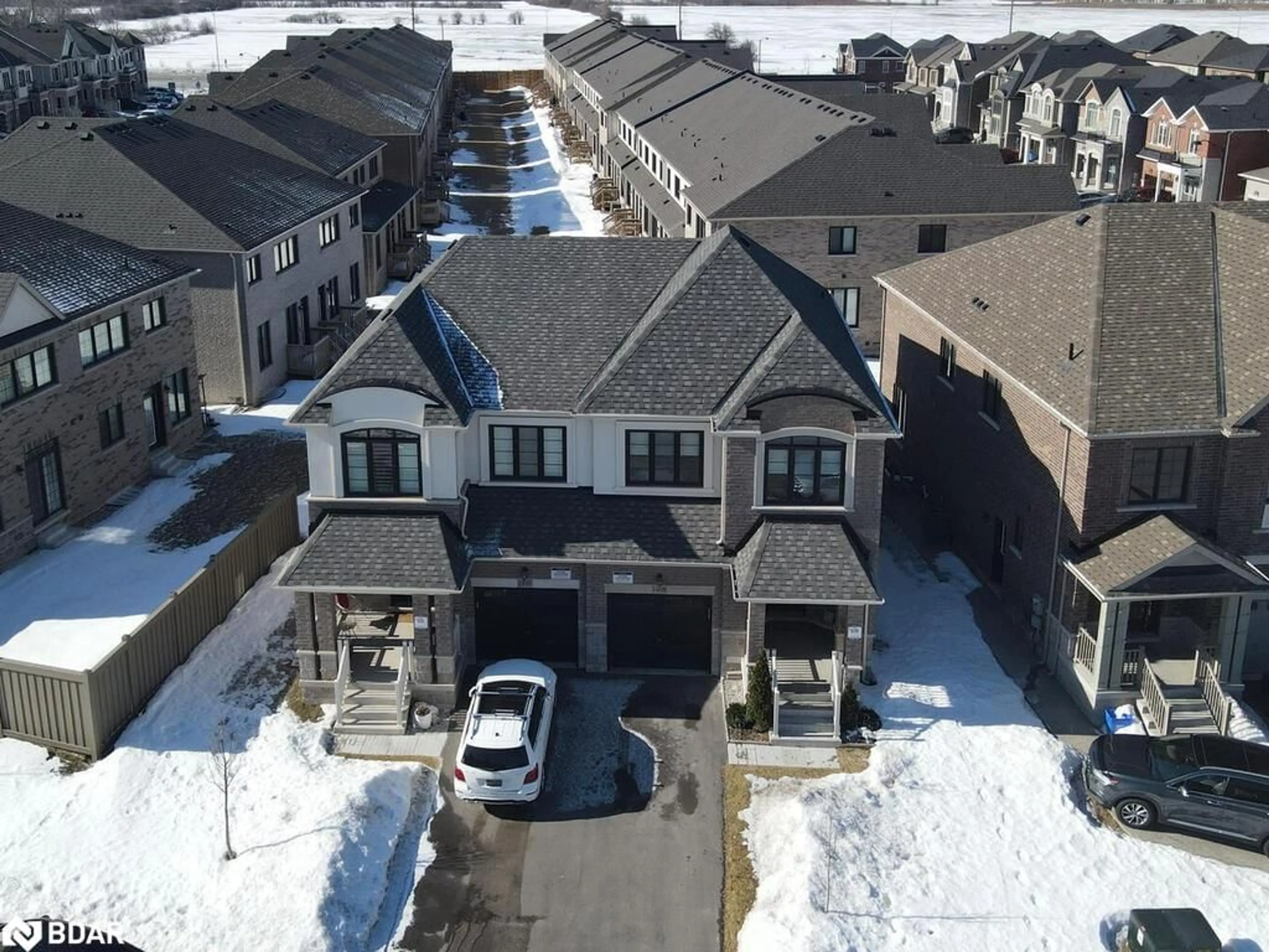 A pic from outside/outdoor area/front of a property/back of a property/a pic from drone, street for 1408 Watercress Way, Milton Ontario L9E 1T9