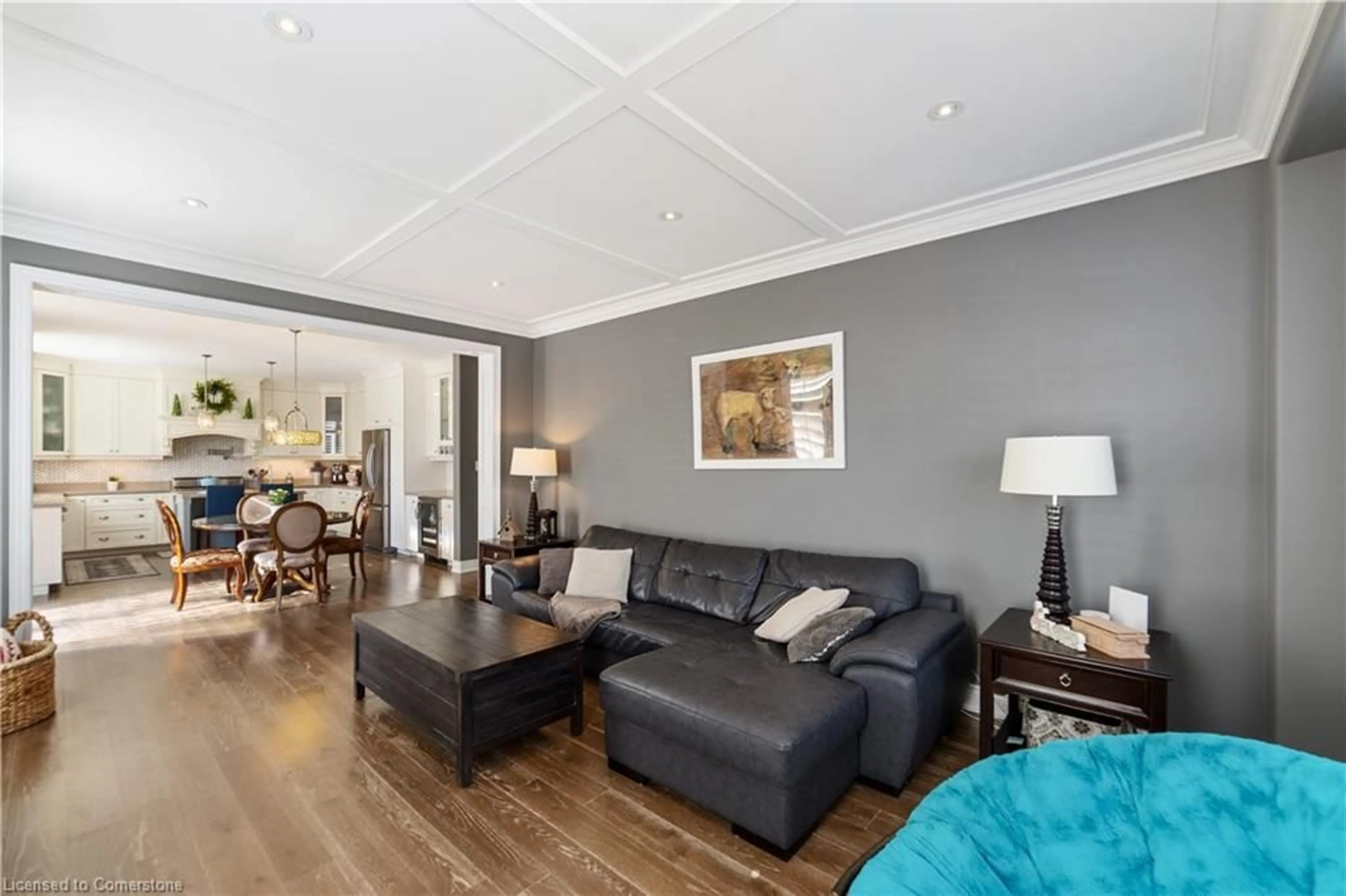 Living room with furniture, wood/laminate floor for 236 Mother's St, Hamilton Ontario L9B 0E1