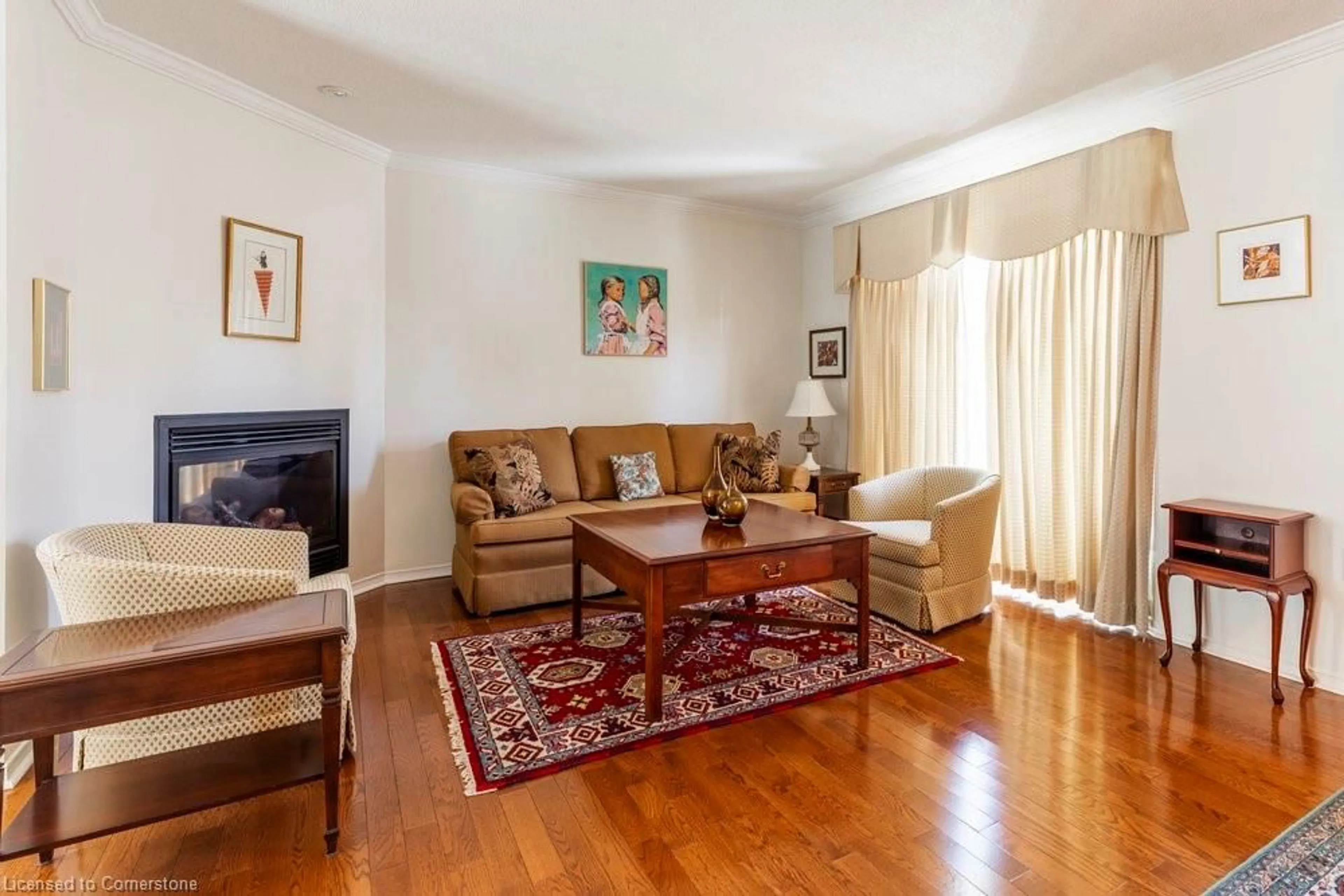 Living room with furniture, wood/laminate floor for 212 Silverbirch Blvd, Mount Hope Ontario L0R 1W0