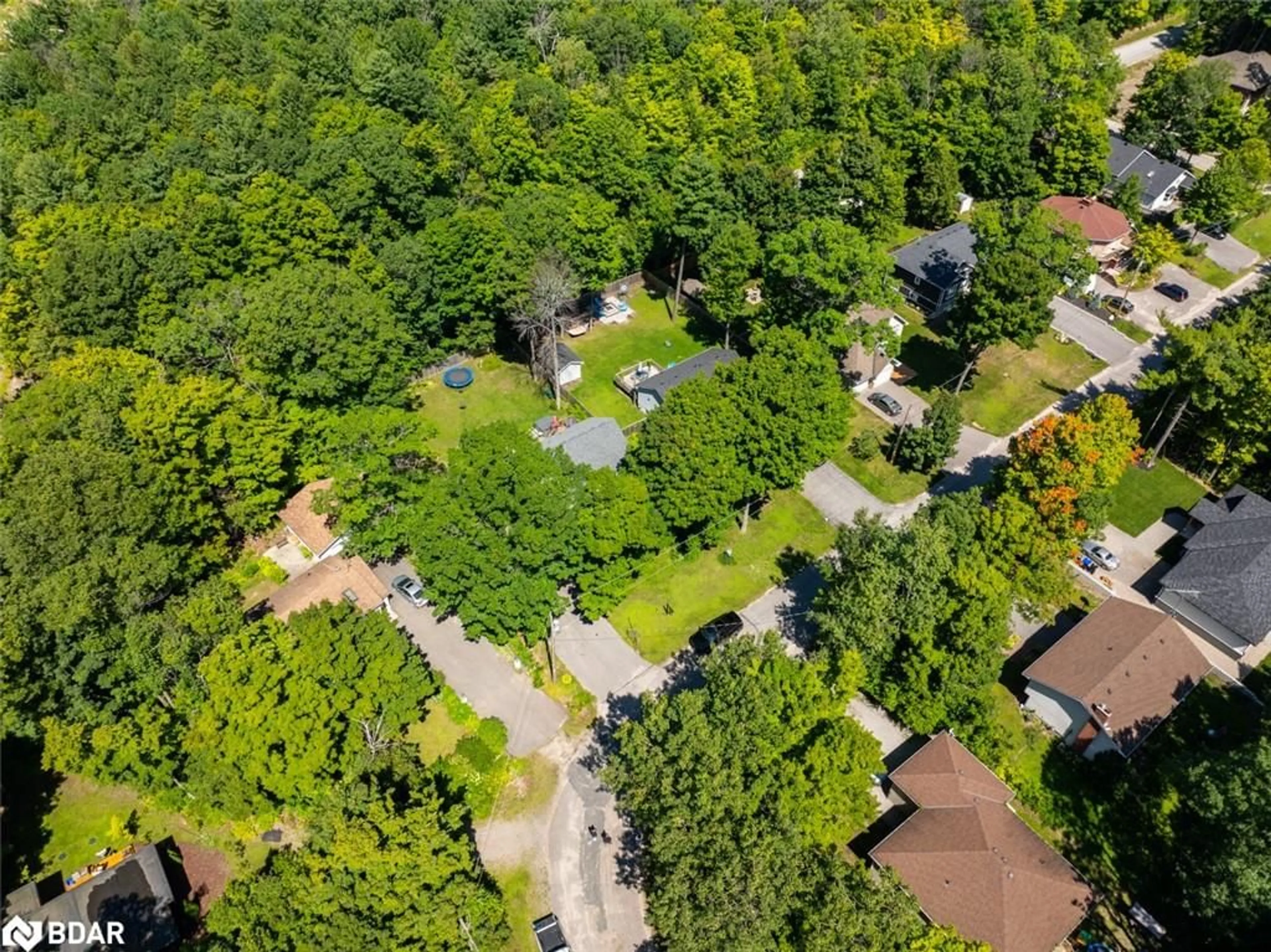 A pic from outside/outdoor area/front of a property/back of a property/a pic from drone, forest/trees view for 37 St Laurent Blvd, Tiny Ontario L9M 0J2