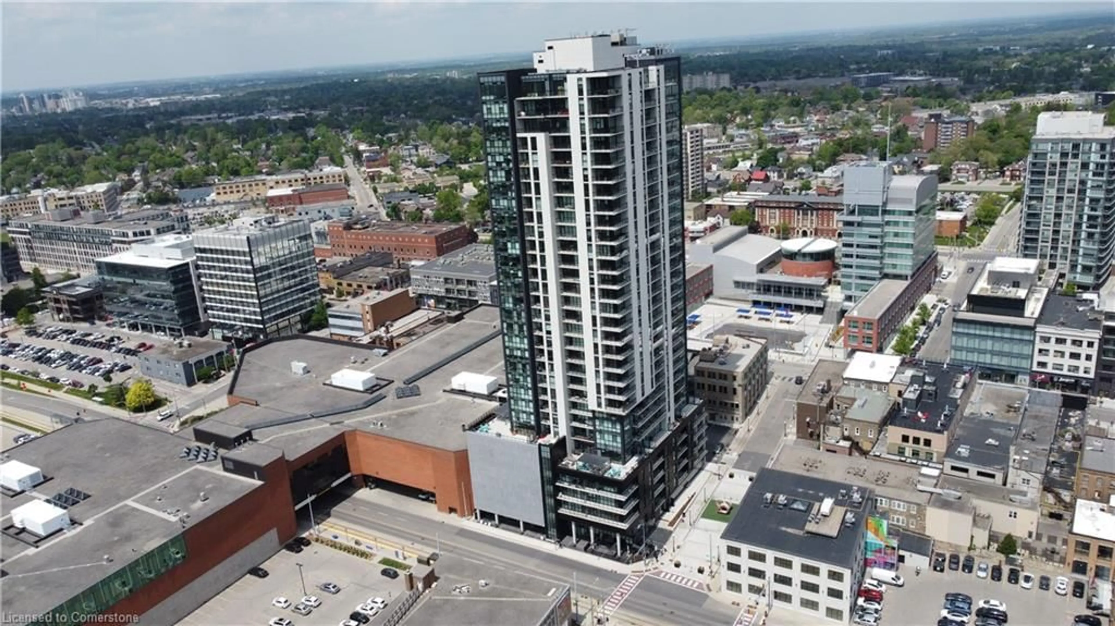 A pic from outside/outdoor area/front of a property/back of a property/a pic from drone, city buildings view from balcony for 60 Charles St #1601, Kitchener Ontario N2G 0C9