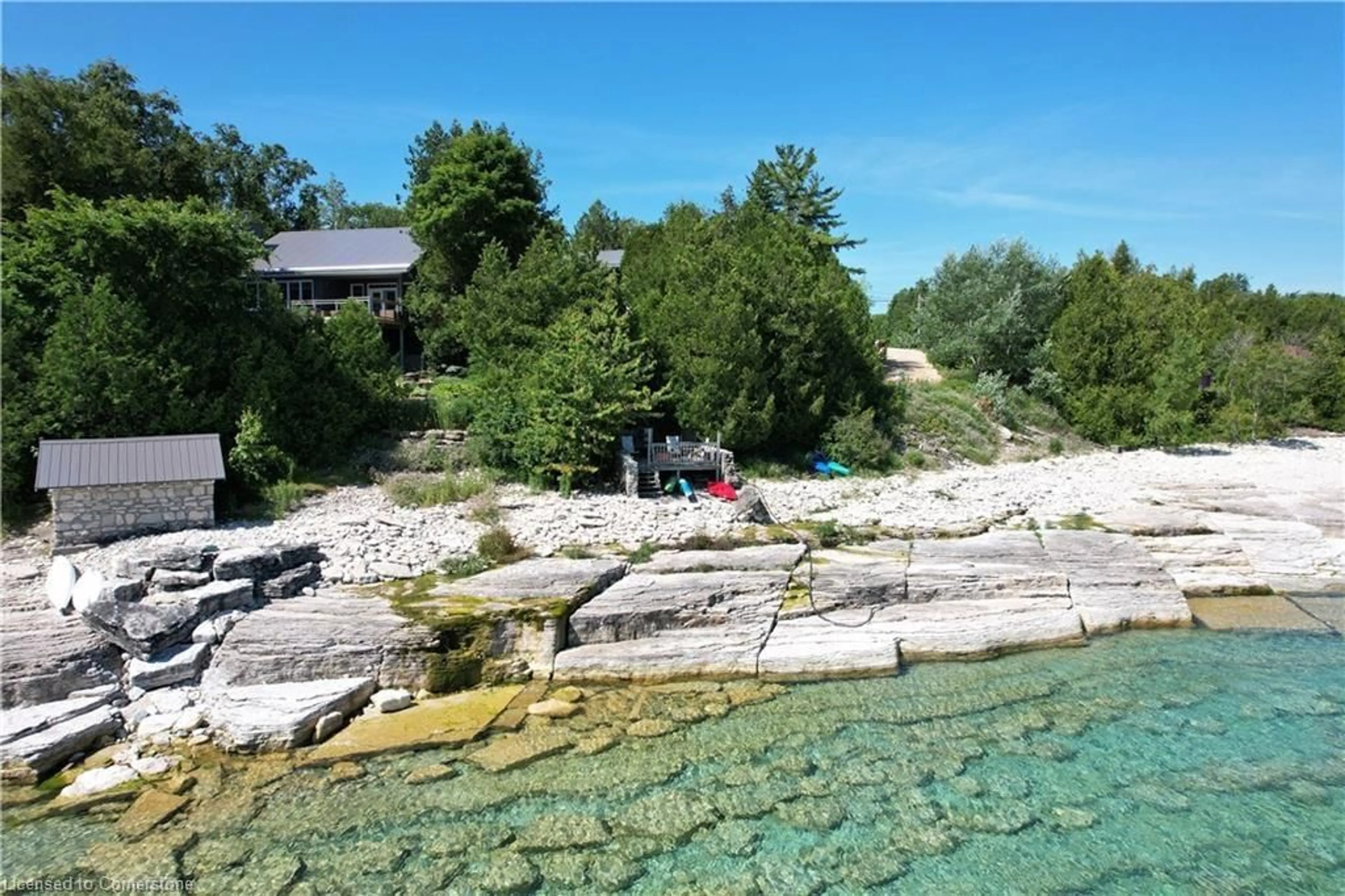 A pic from outside/outdoor area/front of a property/back of a property/a pic from drone, water/lake/river/ocean view for 6 Chetwynd Lane, Lion's Head Ontario N0H 1W0