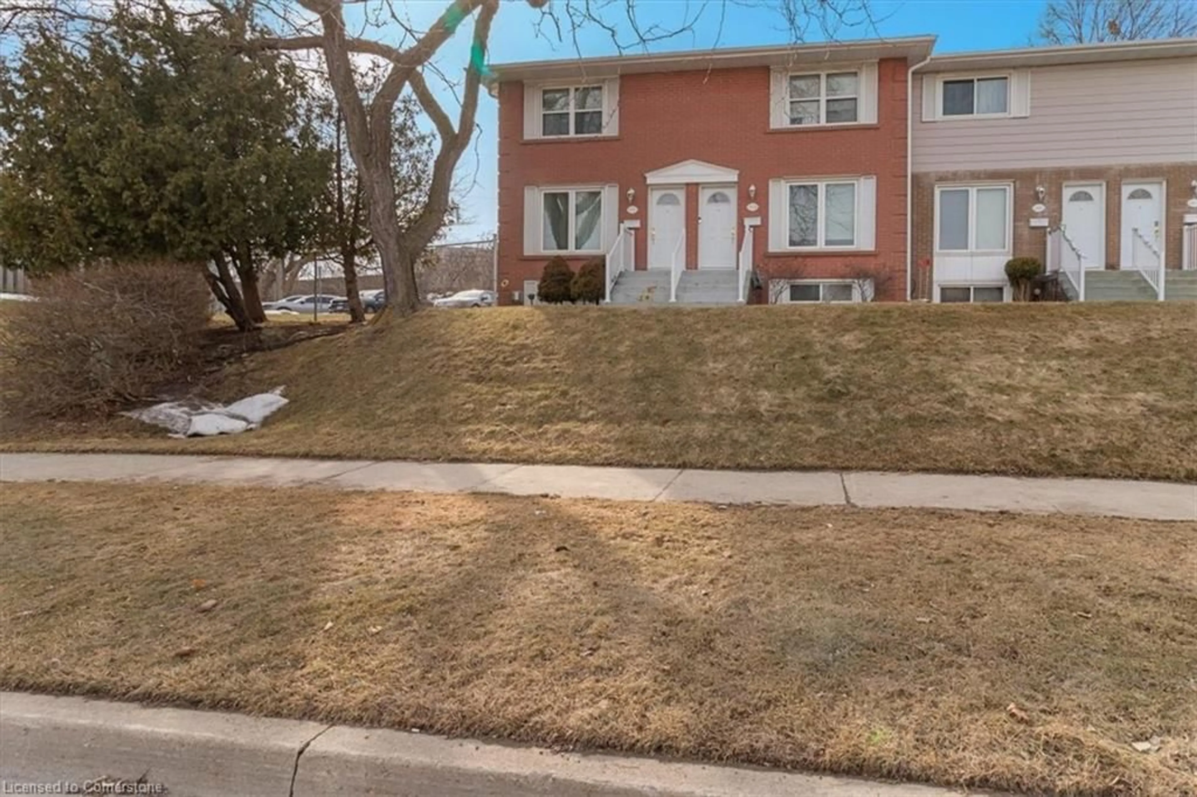 A pic from outside/outdoor area/front of a property/back of a property/a pic from drone, street for 2101A Meadowbrook Rd, Burlington Ontario L7P 2A5