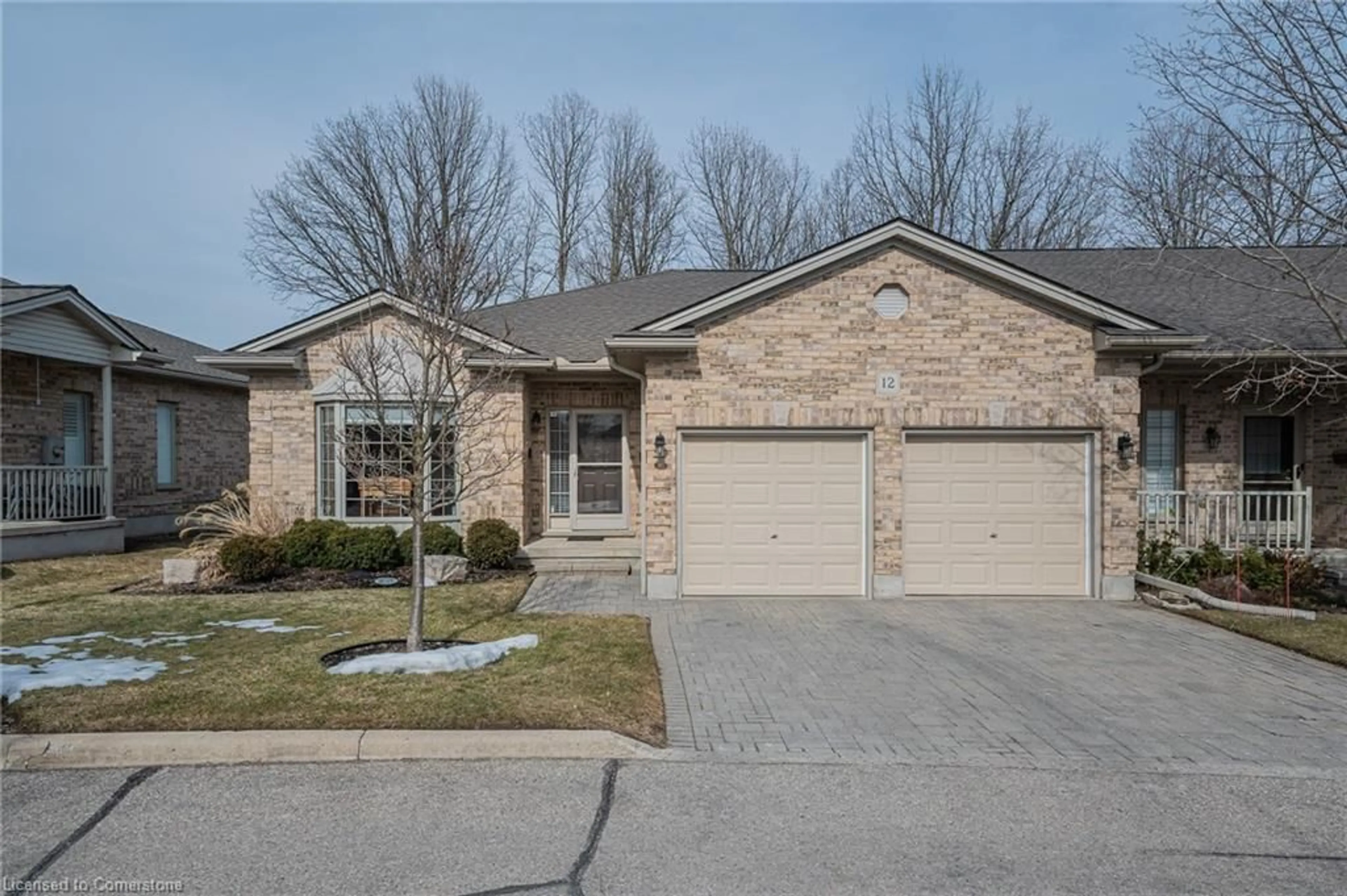 Home with brick exterior material, street for 900 Doon Village Rd #12, Kitchener Ontario N2P 1A4
