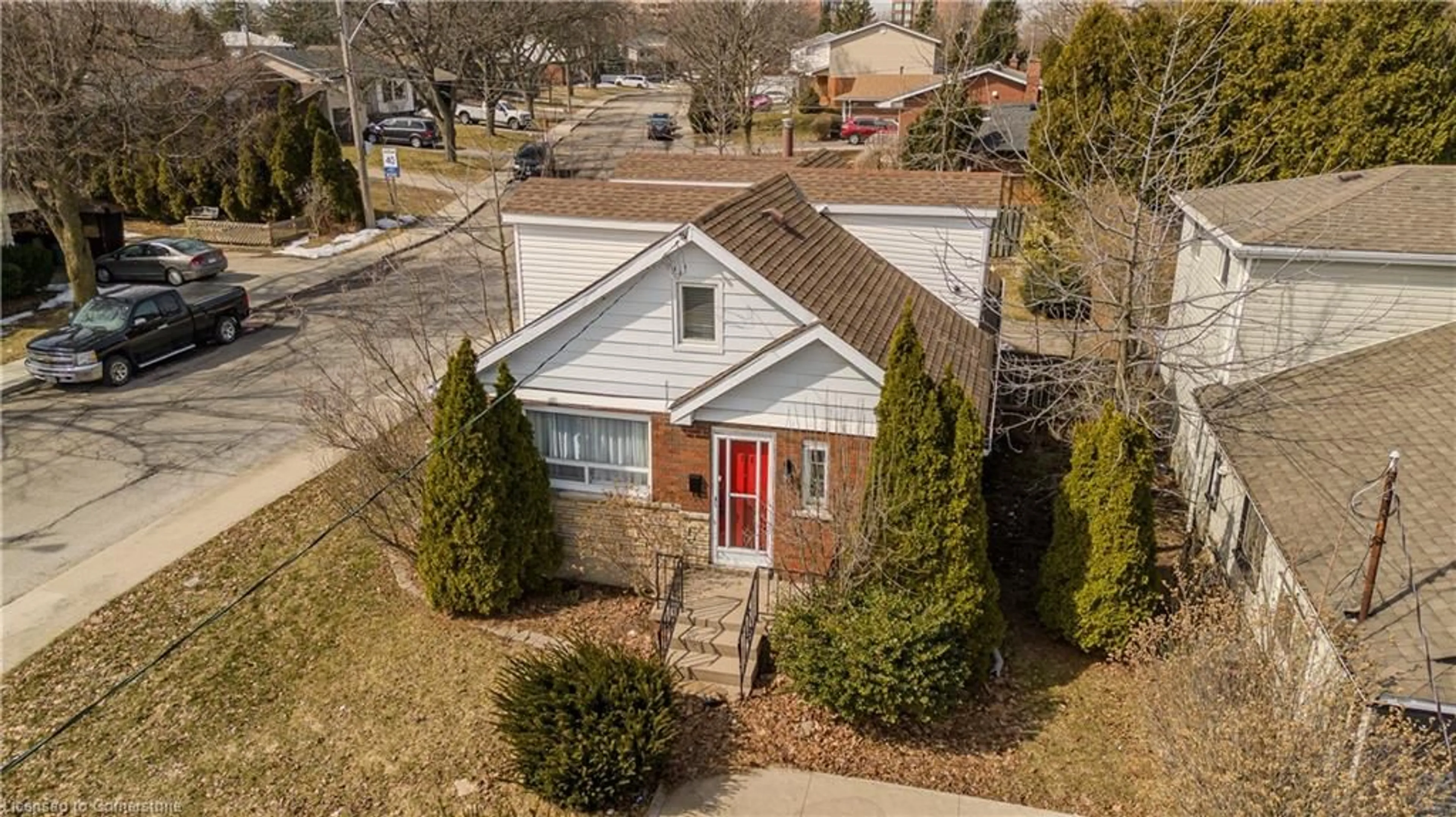 A pic from outside/outdoor area/front of a property/back of a property/a pic from drone, street for 708 West 5th St, Hamilton Ontario L9C 3R2