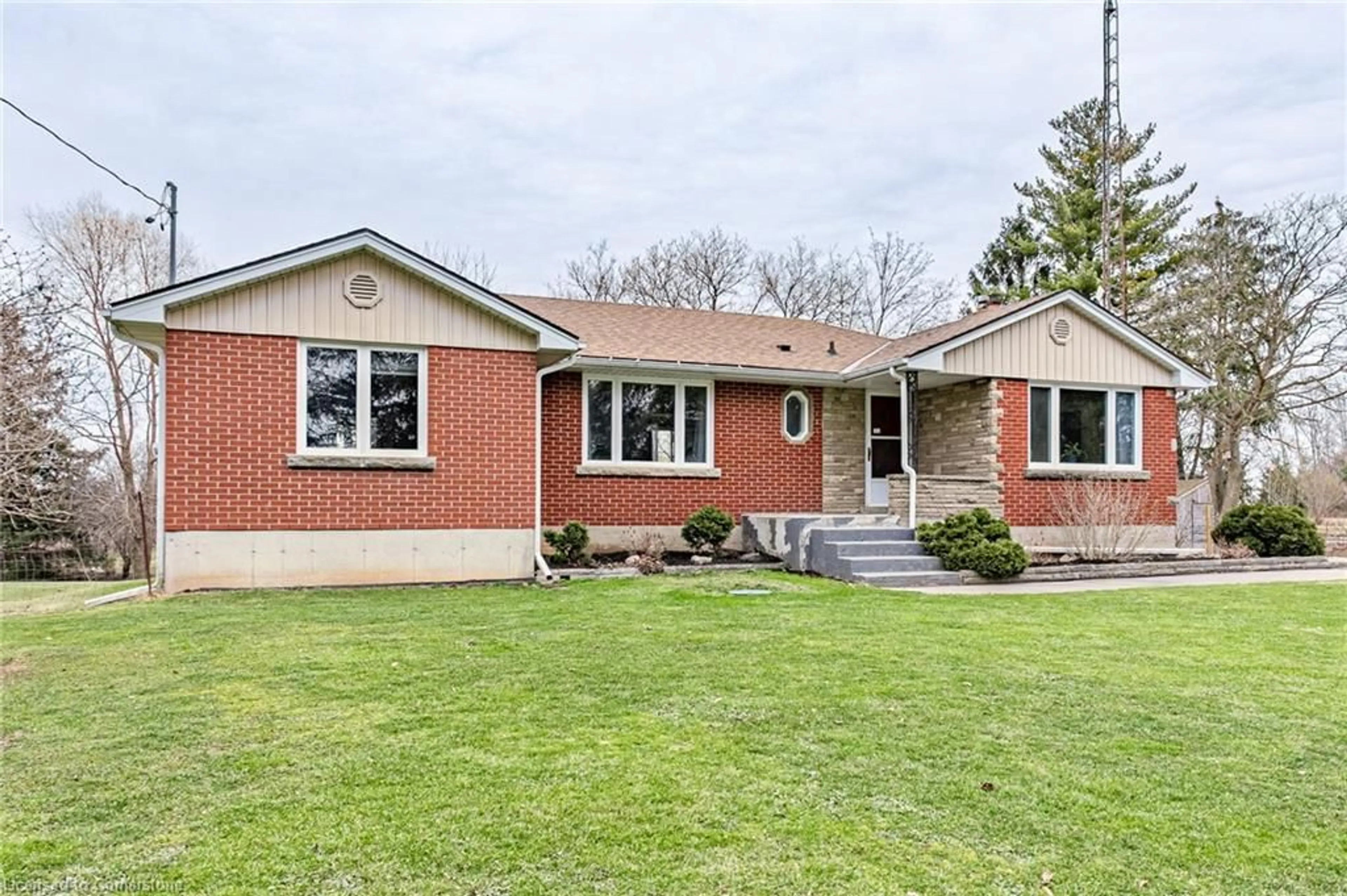 Home with brick exterior material, street for 122 Old Onondaga Rd, Brantford Ontario N3R 0C1