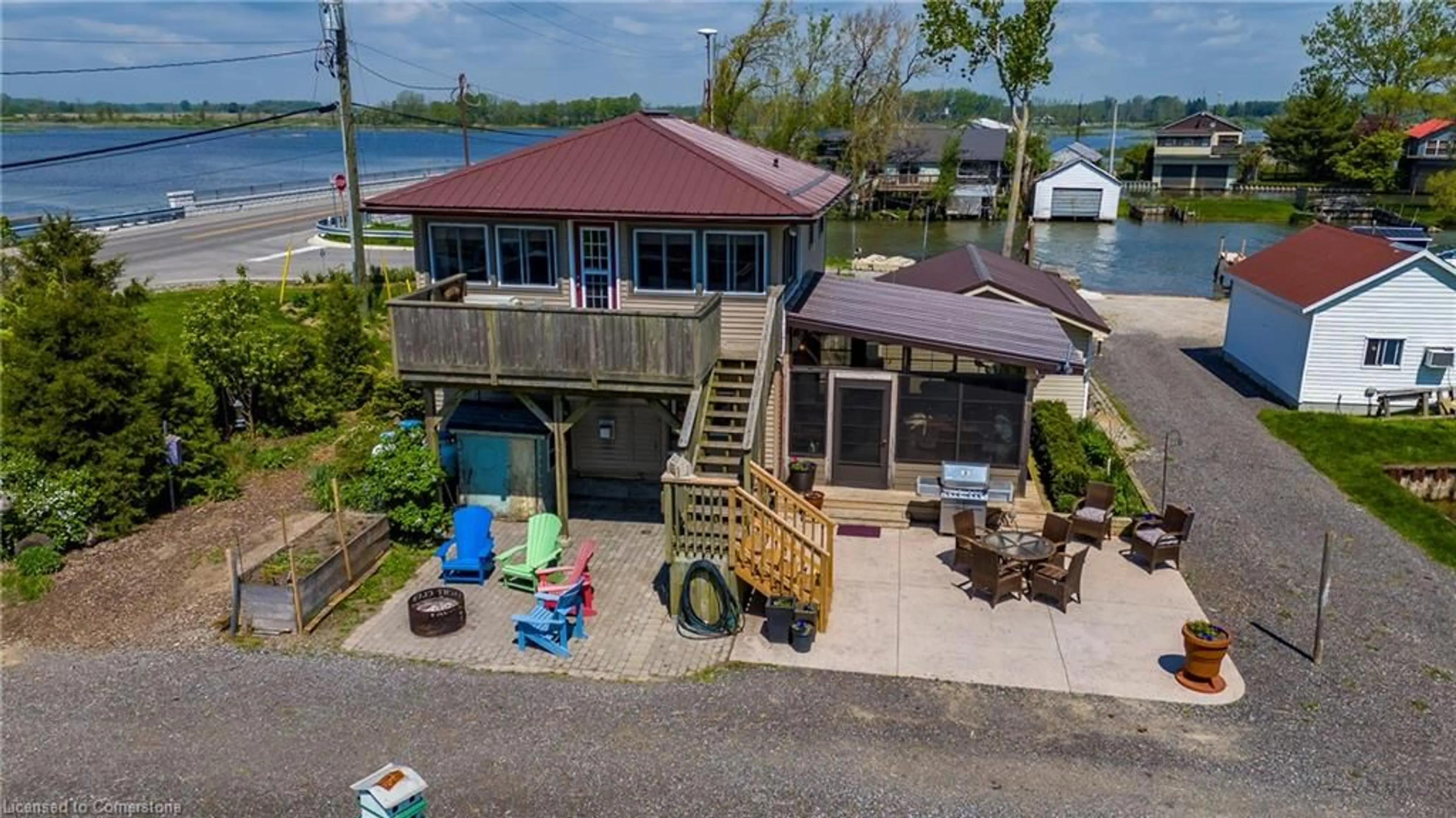 A pic from outside/outdoor area/front of a property/back of a property/a pic from drone, water/lake/river/ocean view for 864 59 Hwy, Port Rowan Ontario N0E 1M0